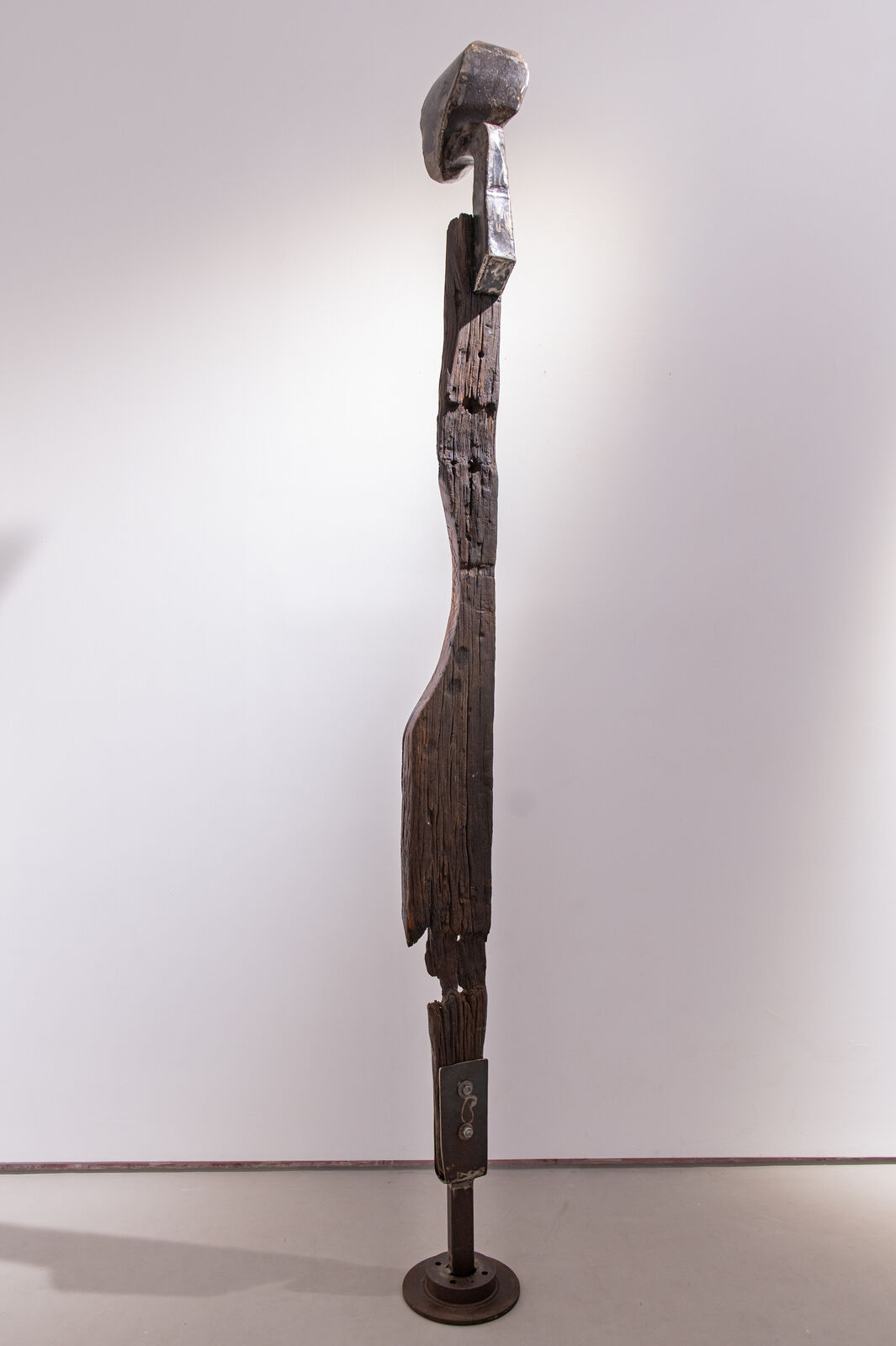 Artwork by Maggie Otieno, Sojourner 2, Made of Railway Sleepers with mixed medium materials 