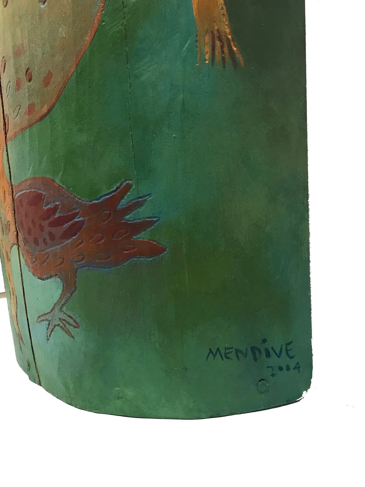 A painted wooden cylinder featuring a whimsical scene of birds and a lizard against a green background.