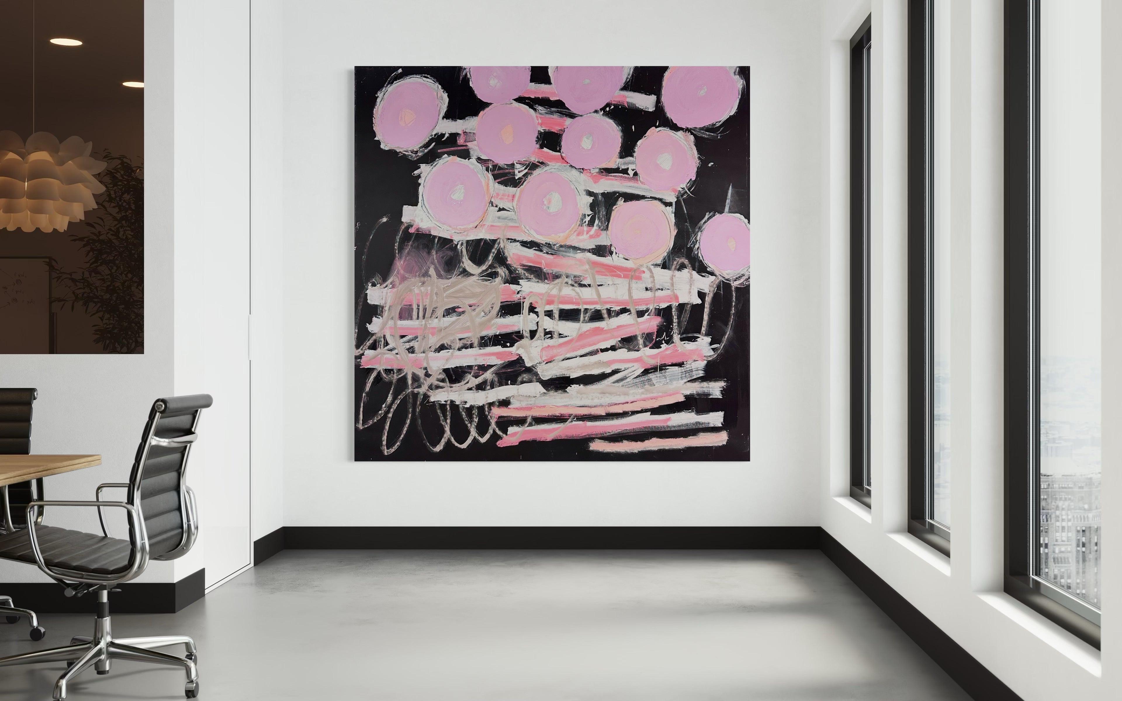 A painting with pink circles on a black background.
