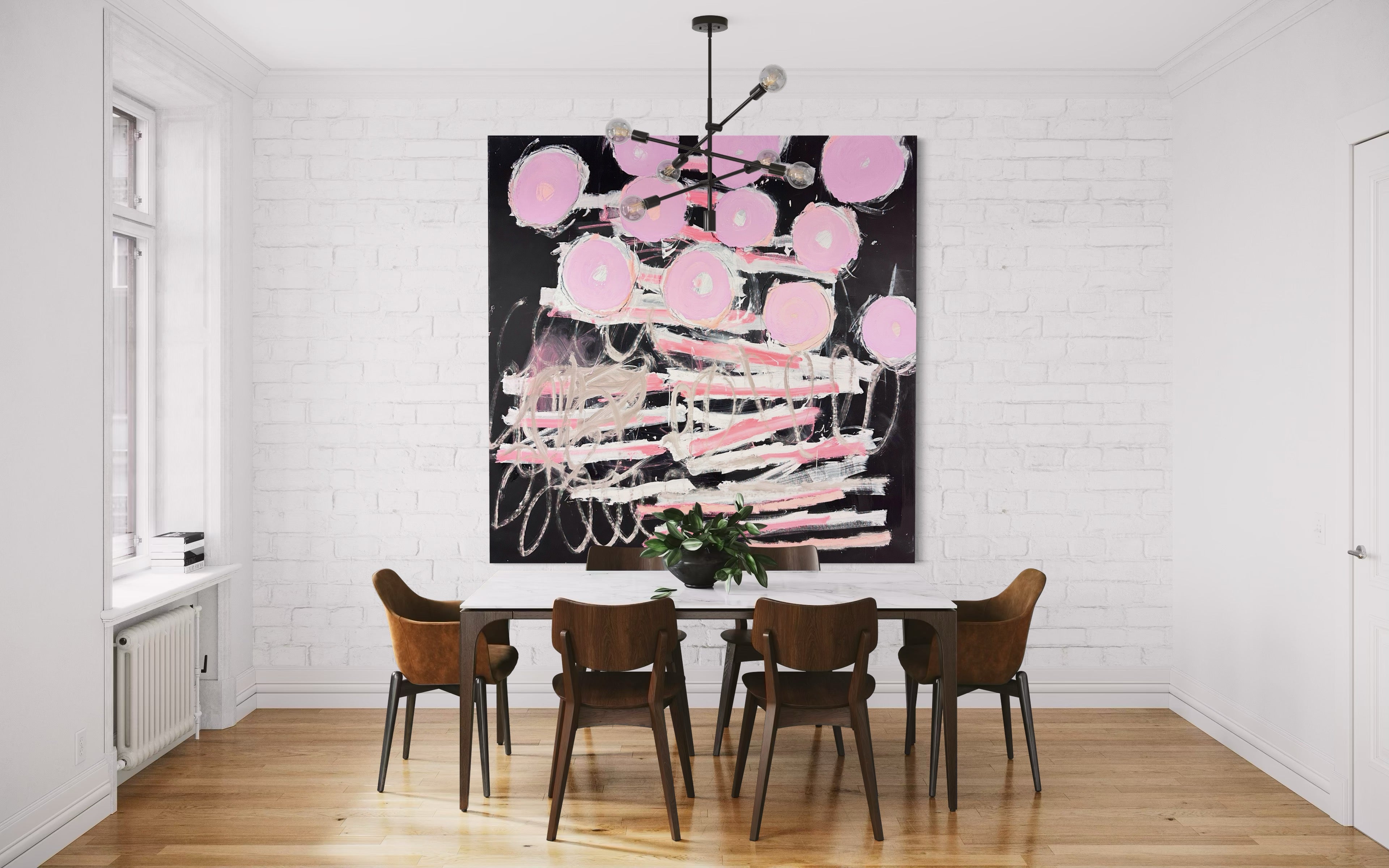 A painting with pink circles on a black background.