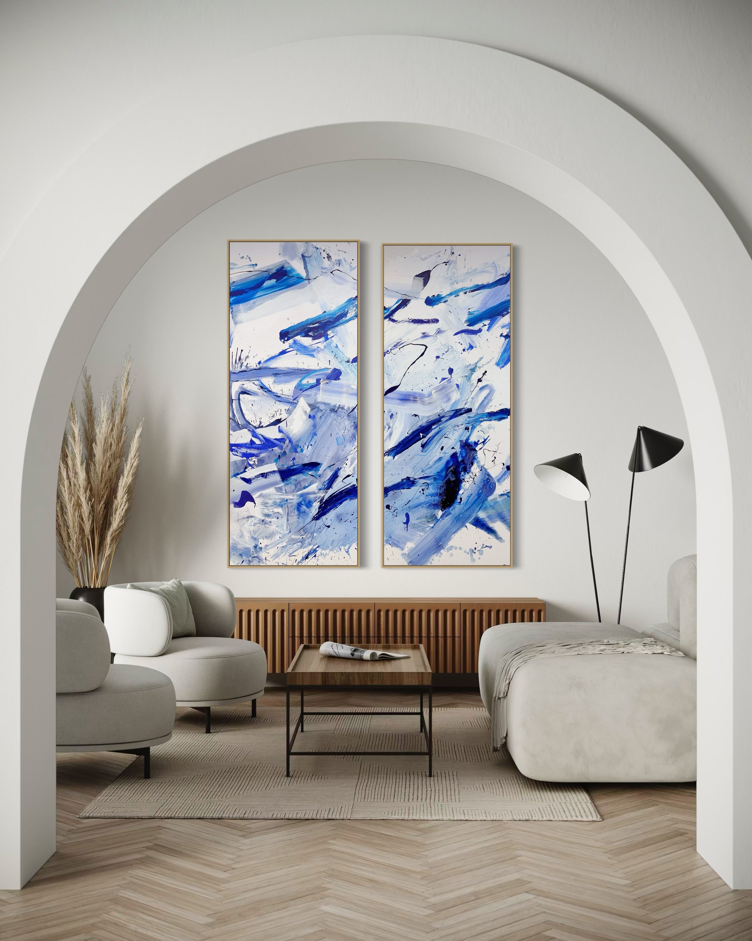 A set of four blue and white abstract paintings on a white background.