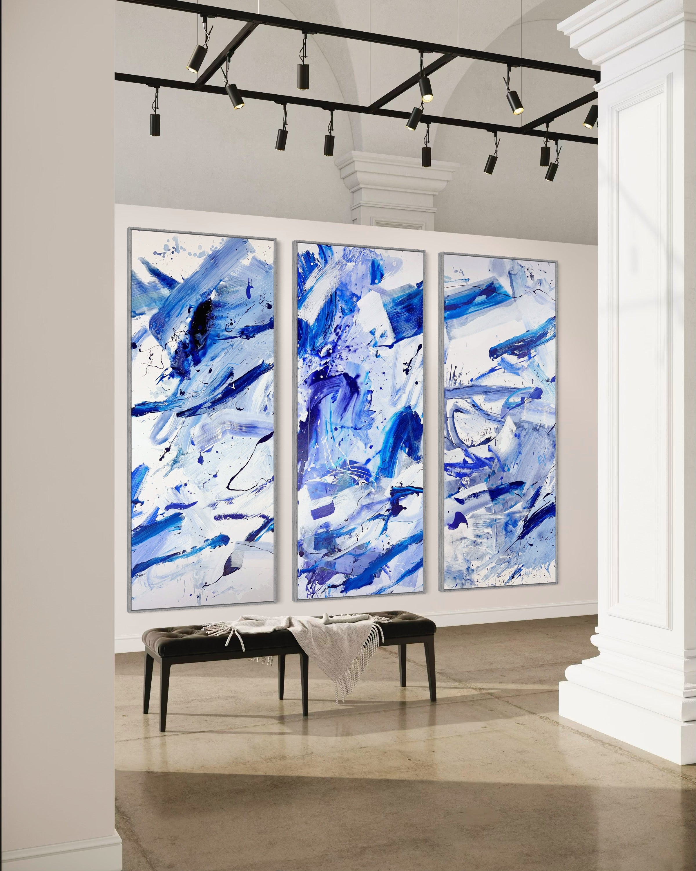 A set of four blue and white abstract paintings on a white background.