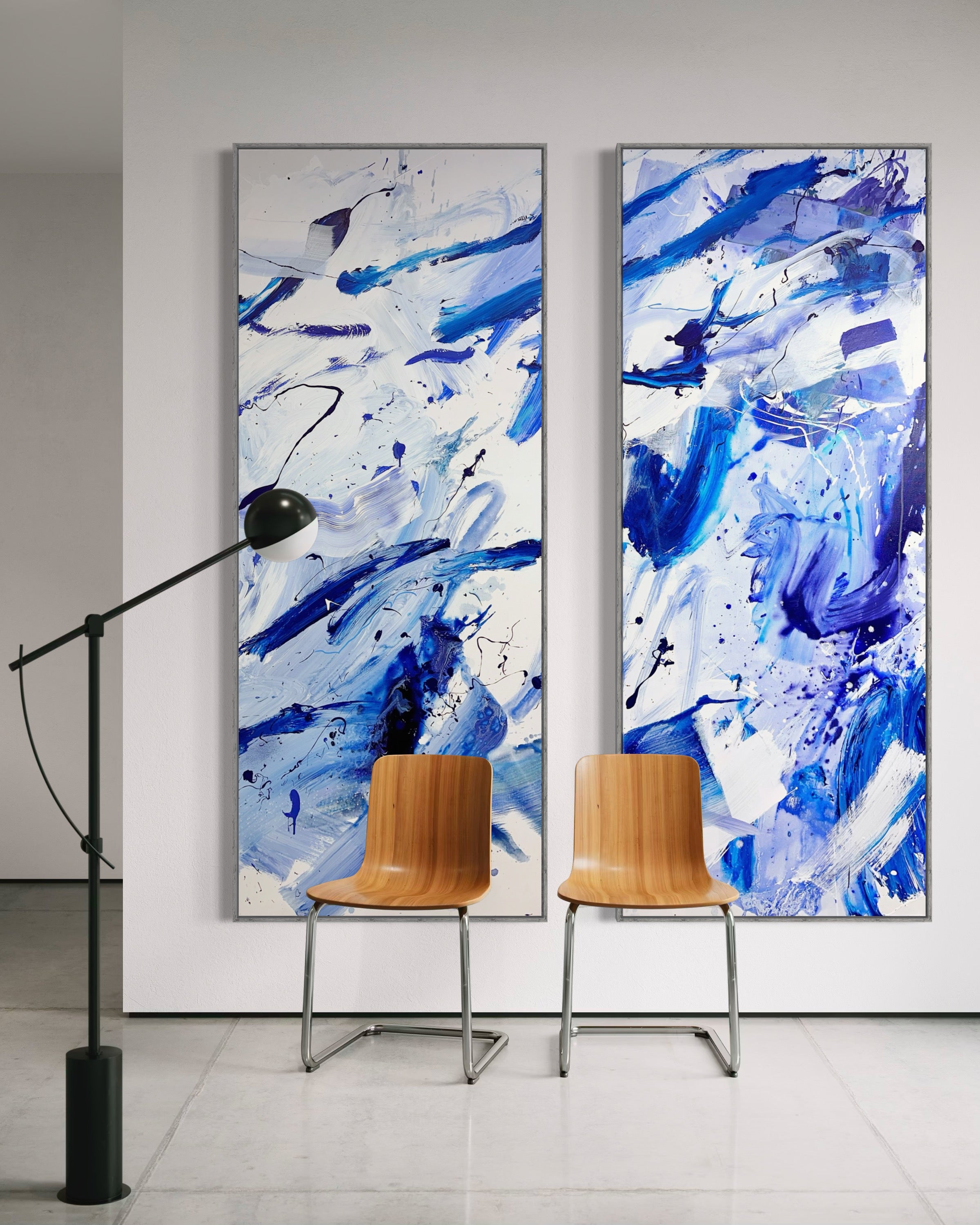 A set of four blue and white abstract paintings on a white background.
