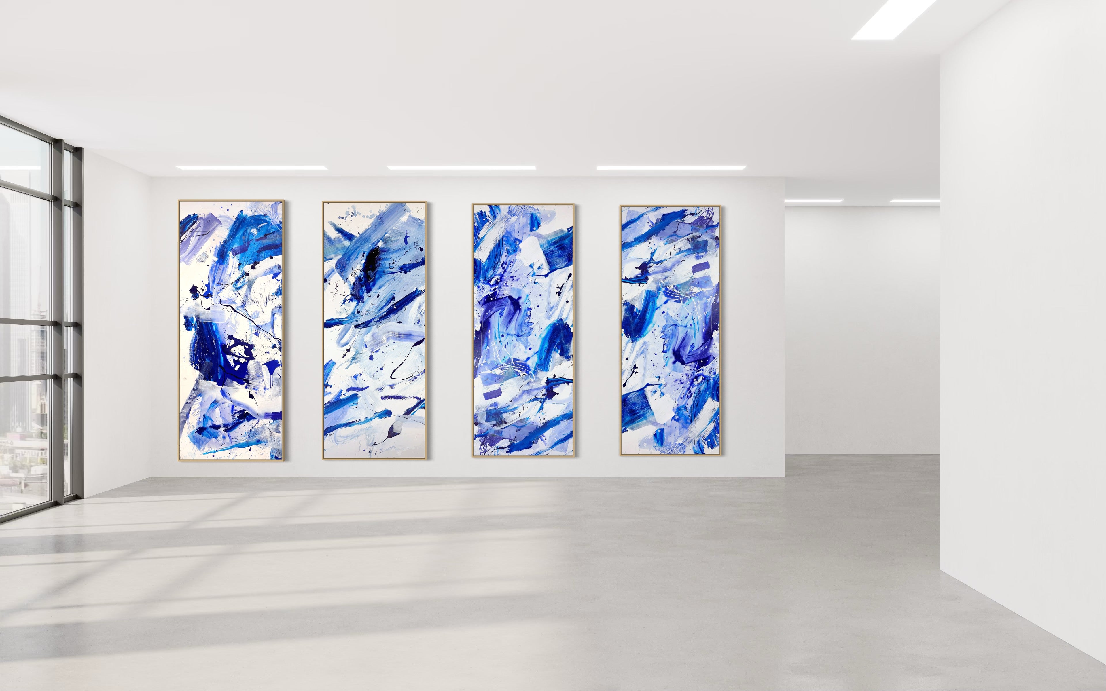 A set of four blue and white abstract paintings on a white background.