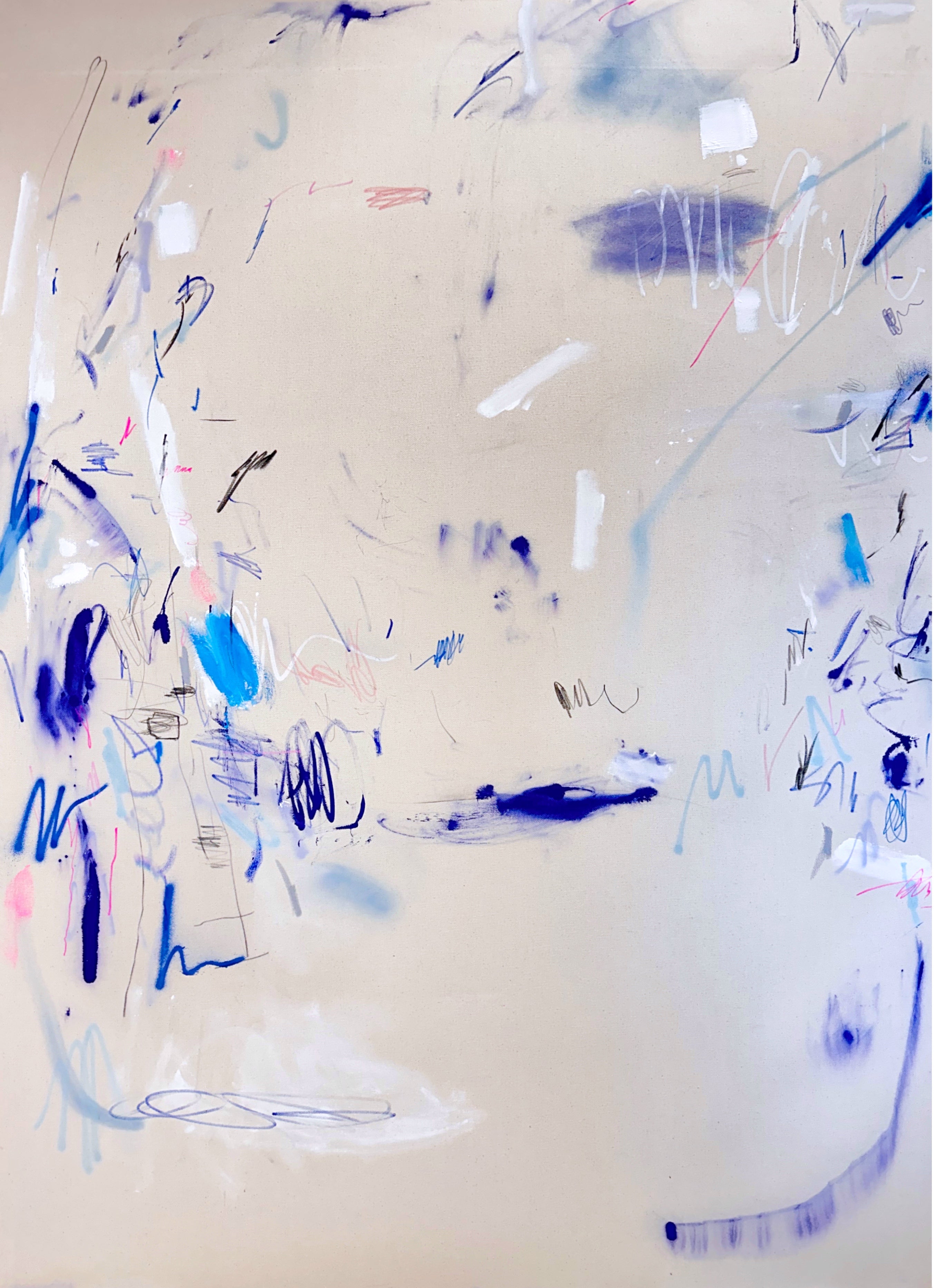 A pair of paintings with blue and white paint on them.