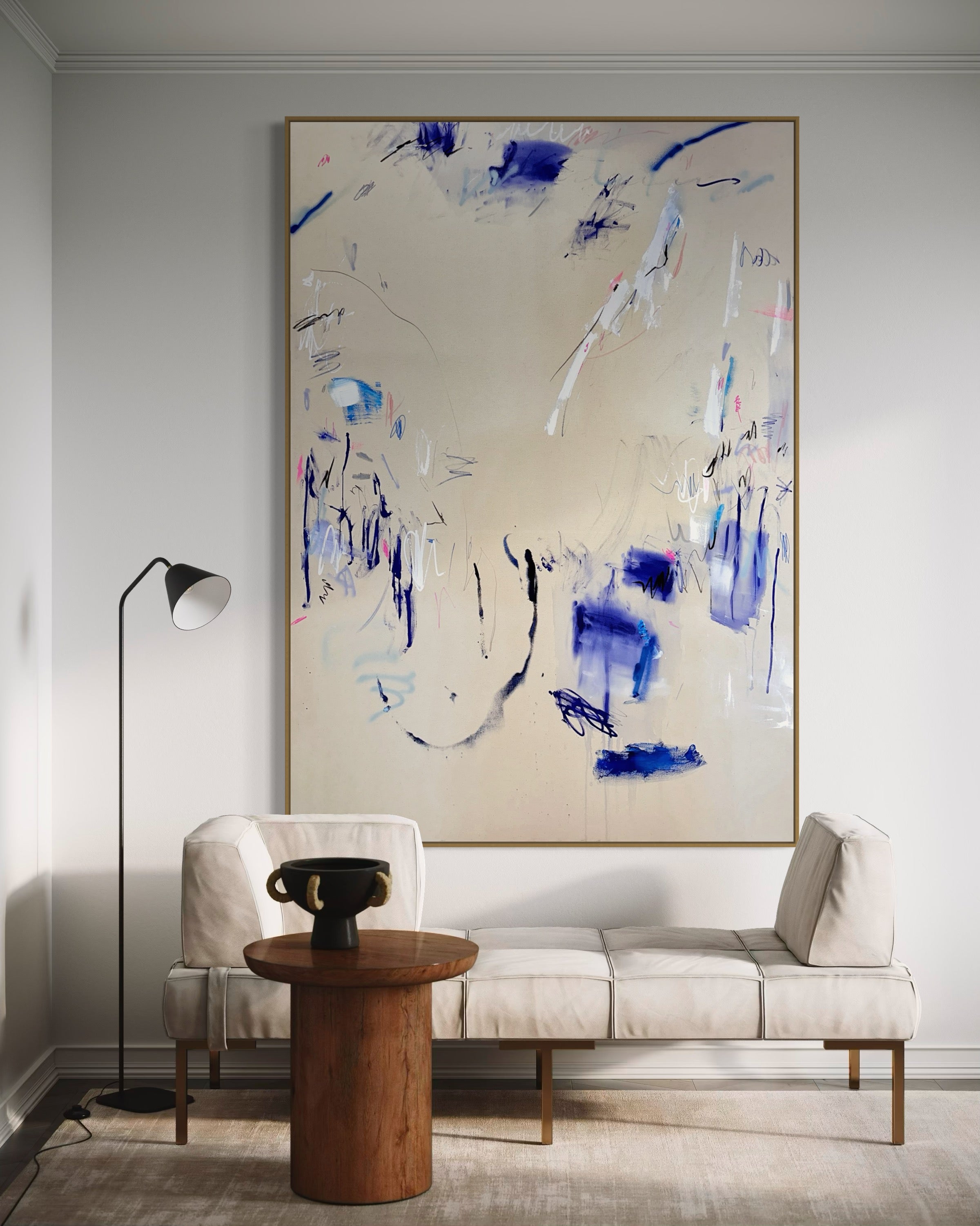 A pair of paintings with blue and white paint on them.