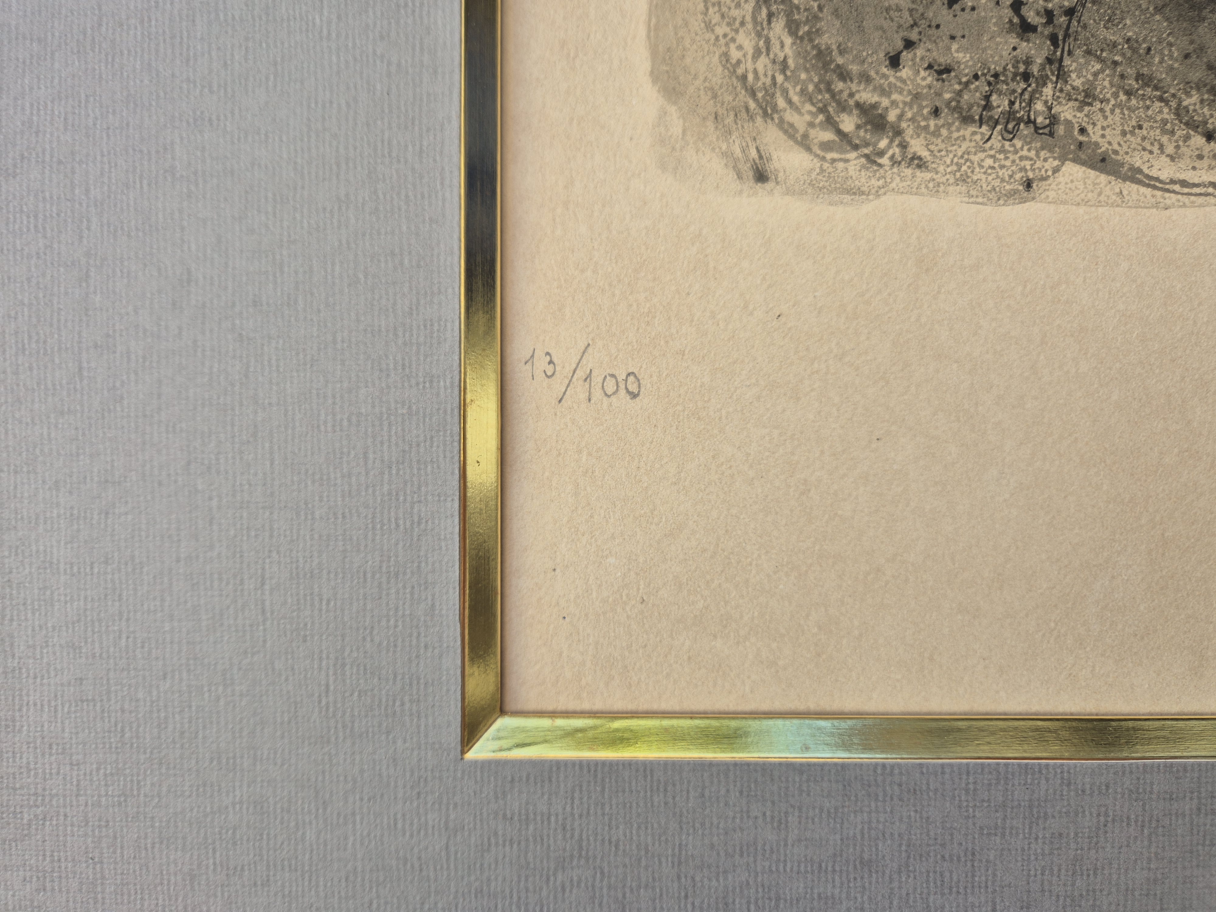 A framed print of a painting in a gold frame.