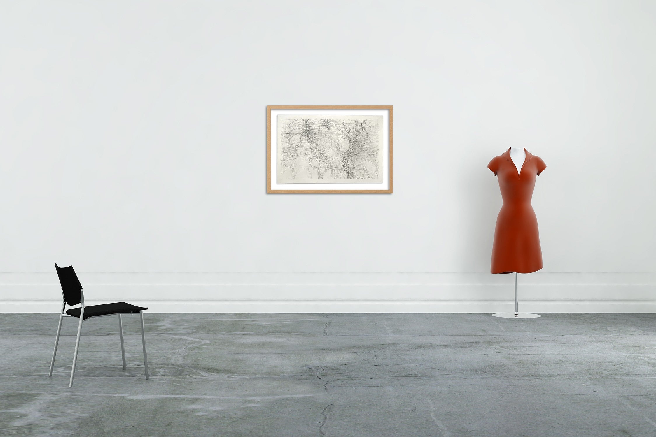 A black and white drawing on a white wall.
