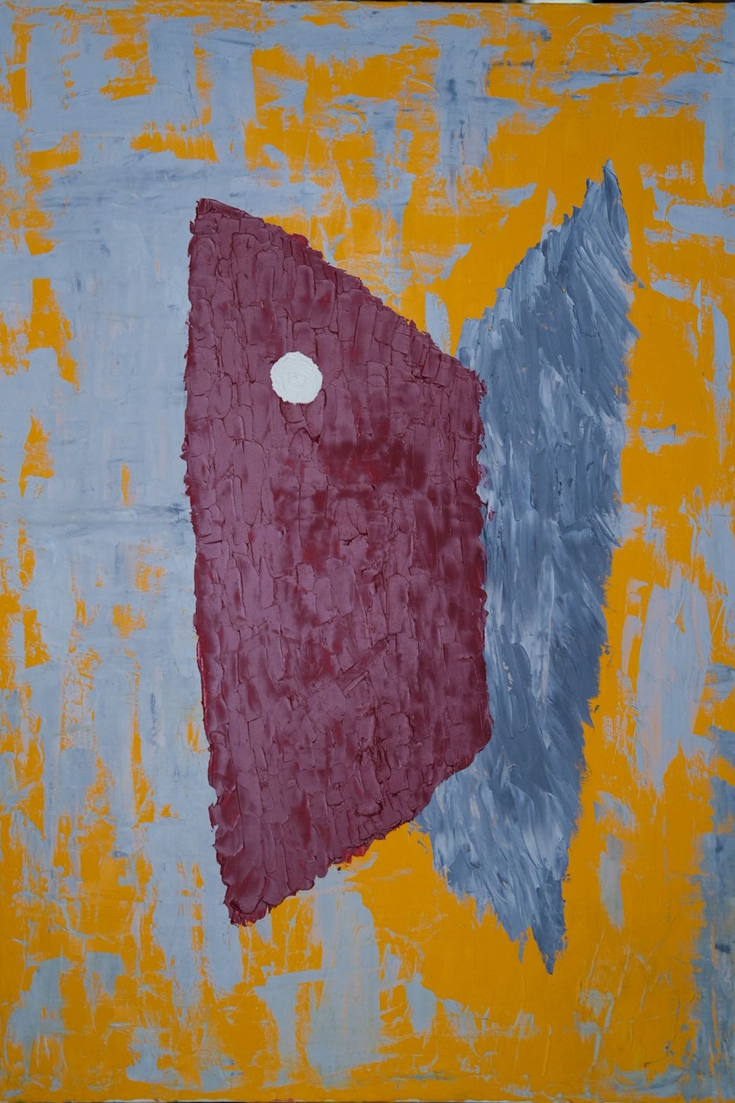 A textured abstract painting featuring a maroon shape against a yellow and blue background.