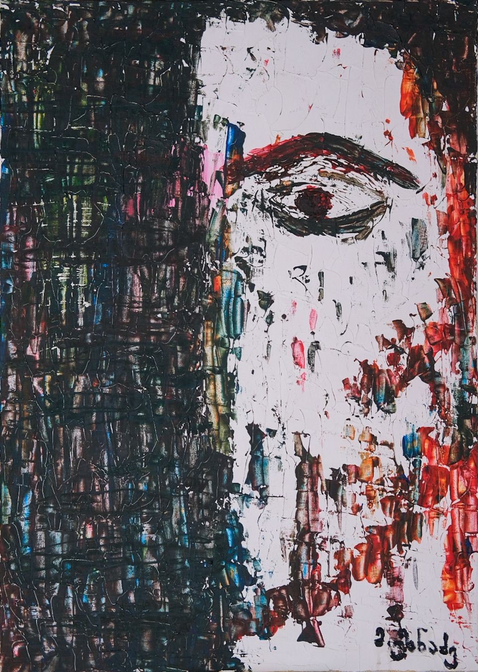 A painting of a man's face on a wall.
