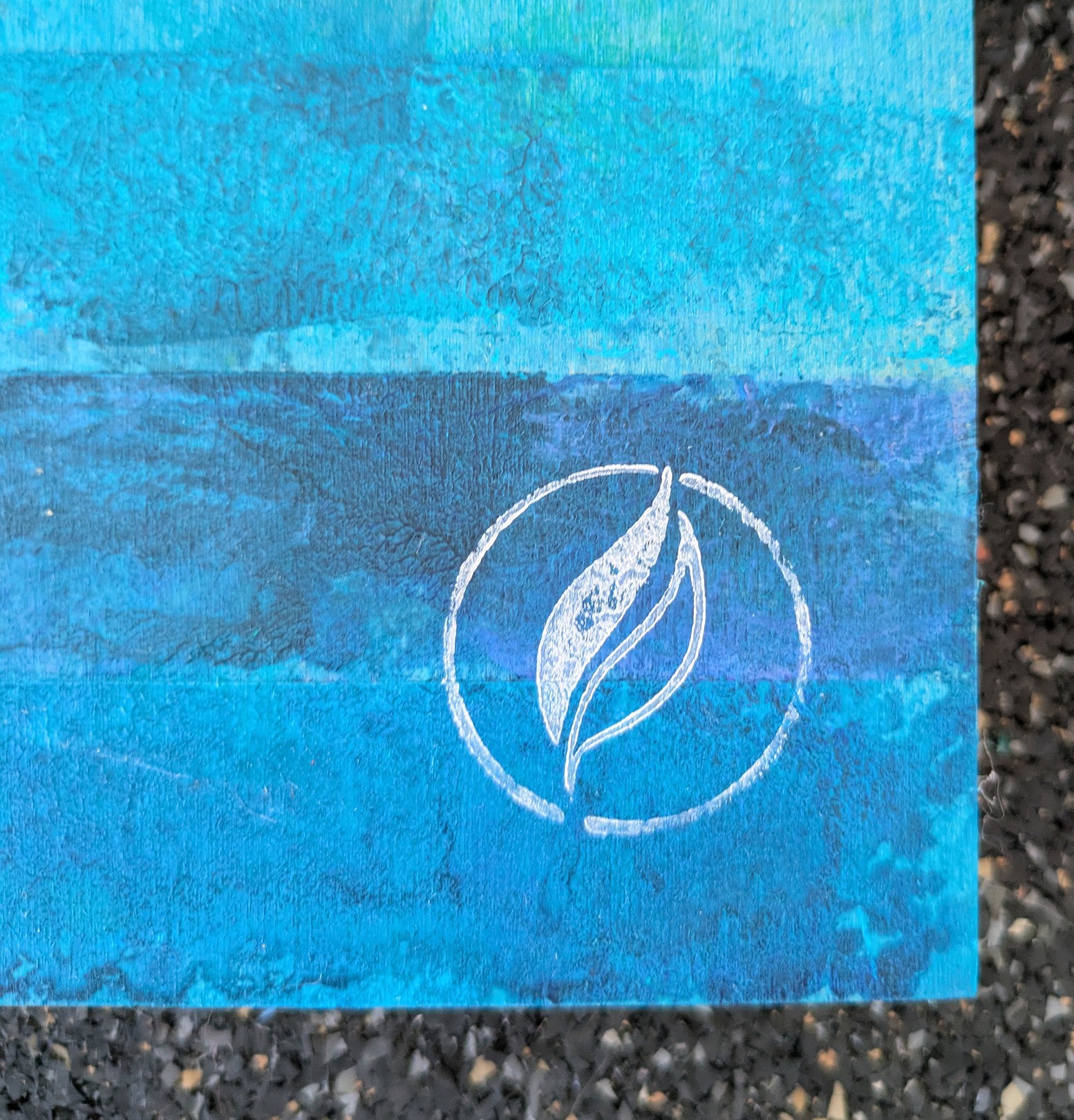 A surreal mixed-media artwork featuring a white bird-like figure against an abstract, layered background of trees and water.