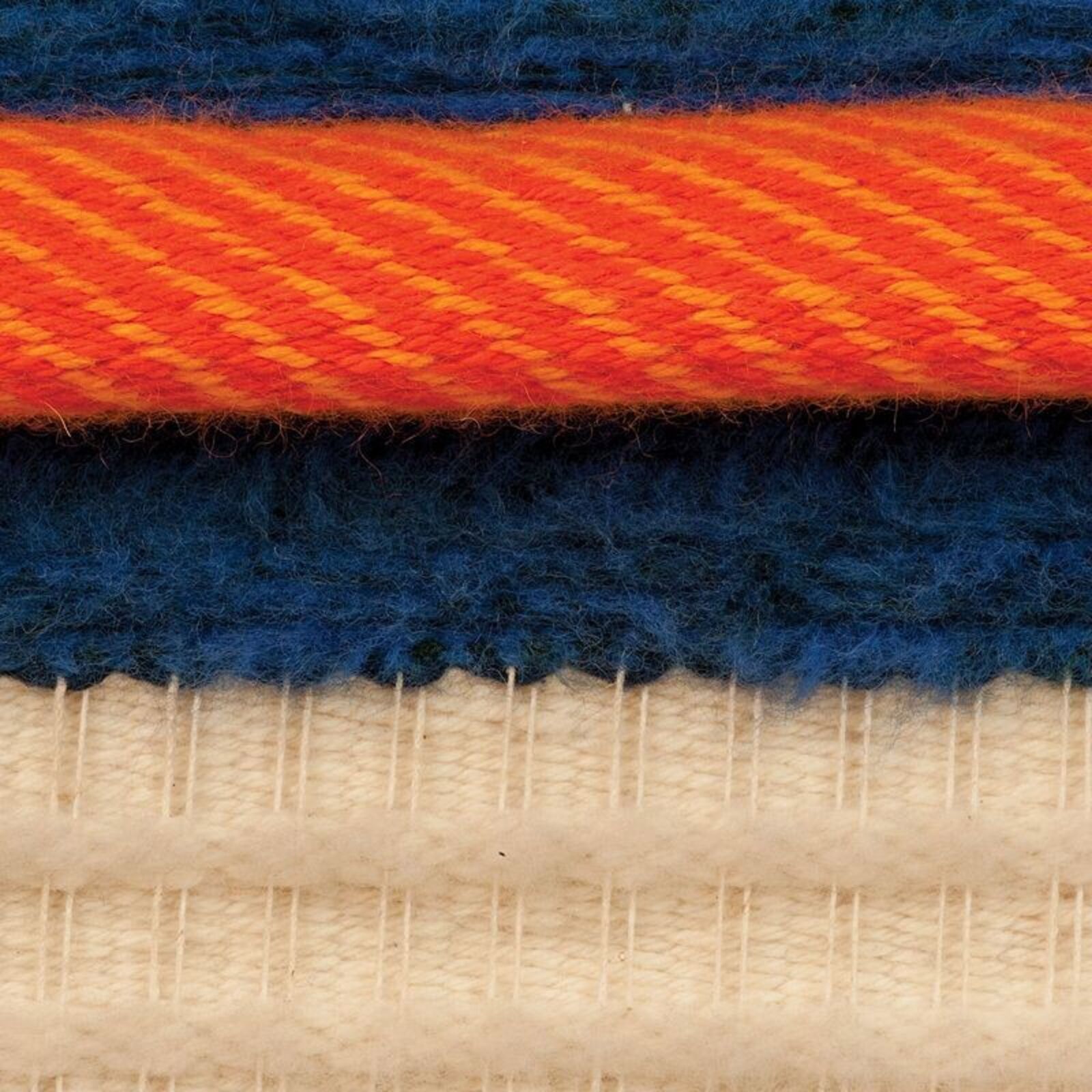 A woven textile featuring a vertical gradient from green to blue with horizontal stripes.