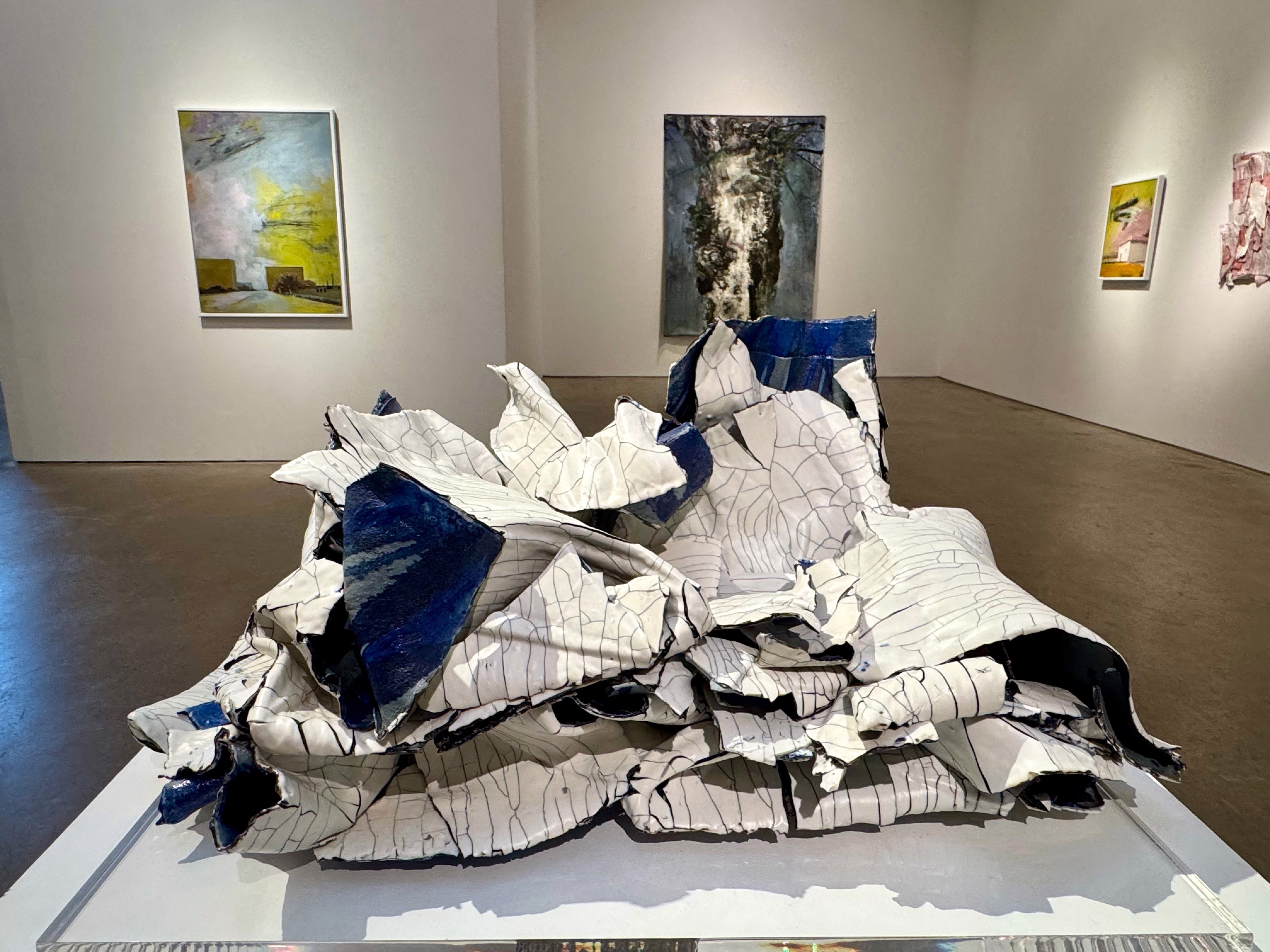 A large piece of art on display in a museum.