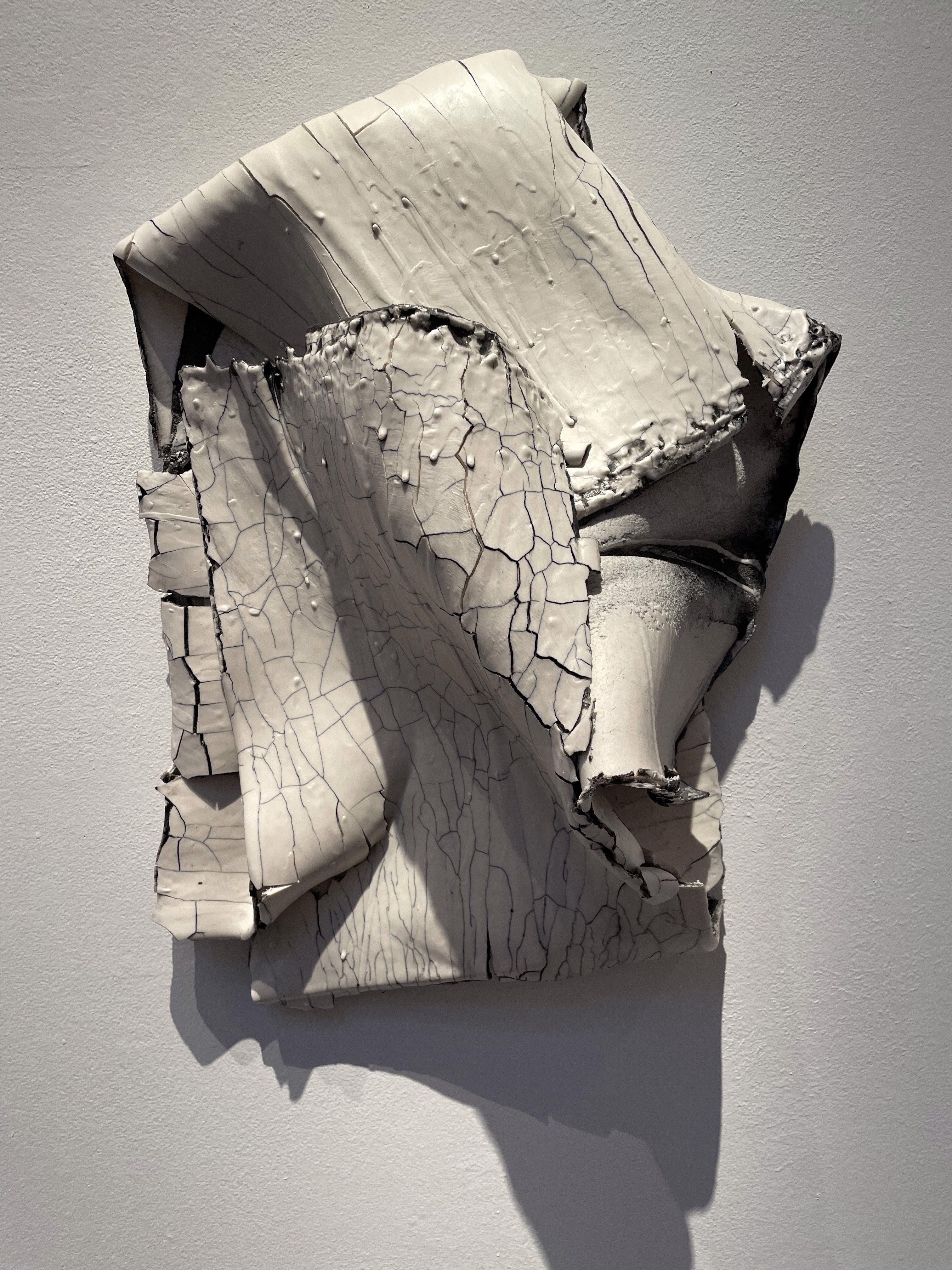 A piece of paper that is on a wall.