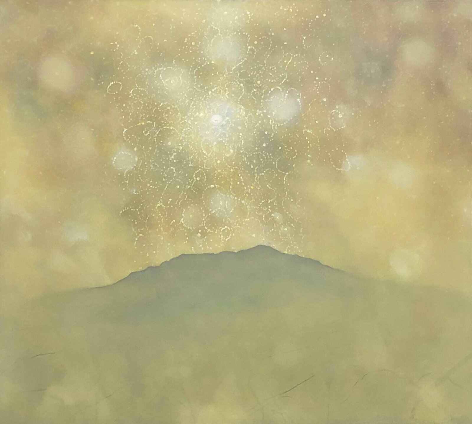 A hazy landscape with a dark silhouette of a hill against a glowing, textured sky.
