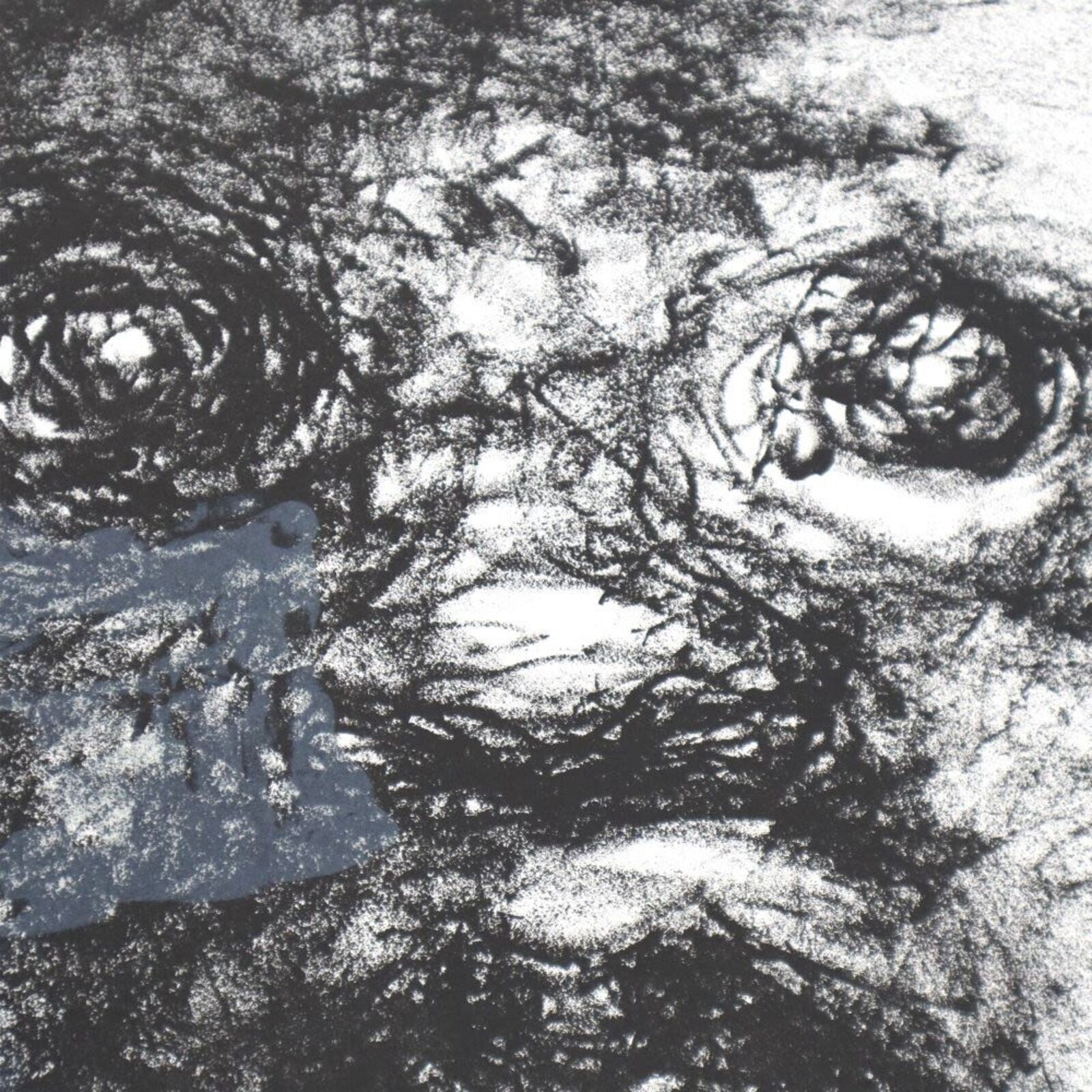 A group of six black and white drawings of a child's face.