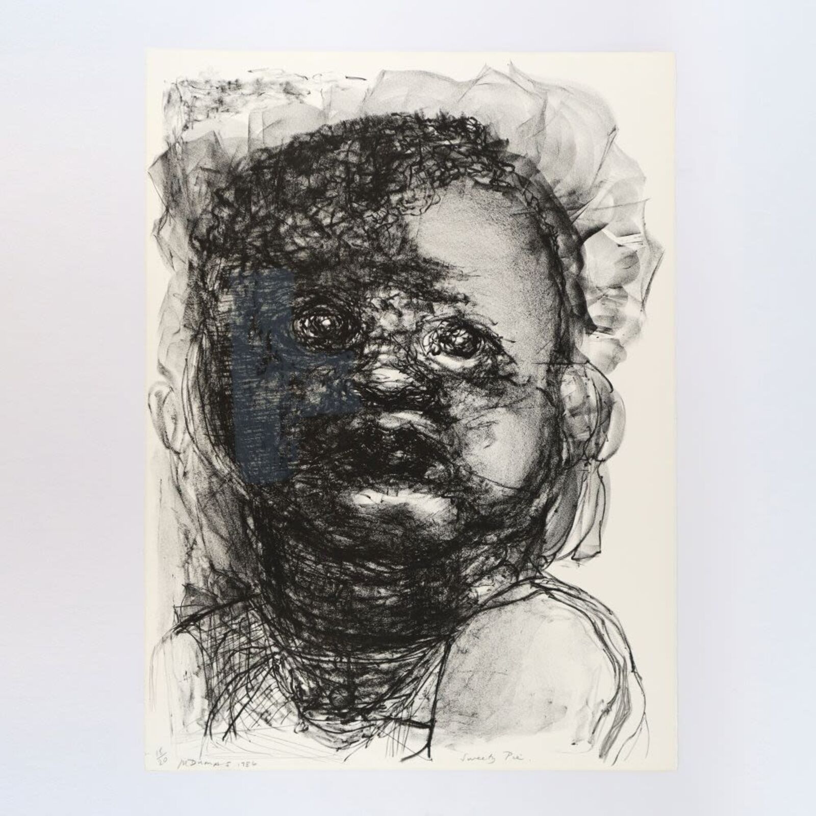 A group of six black and white drawings of a child's face.