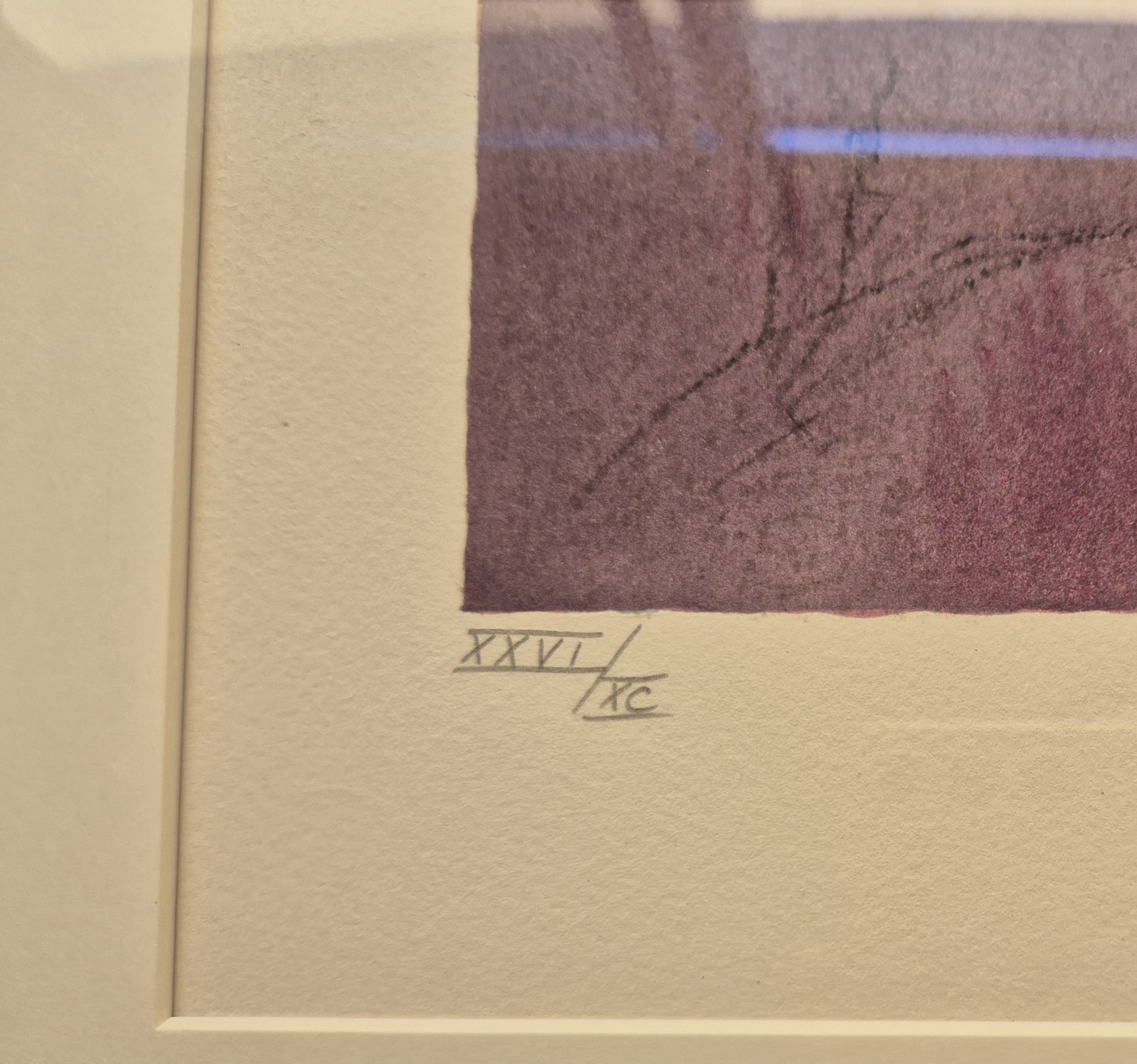 A framed print of a woman sitting on a stage.