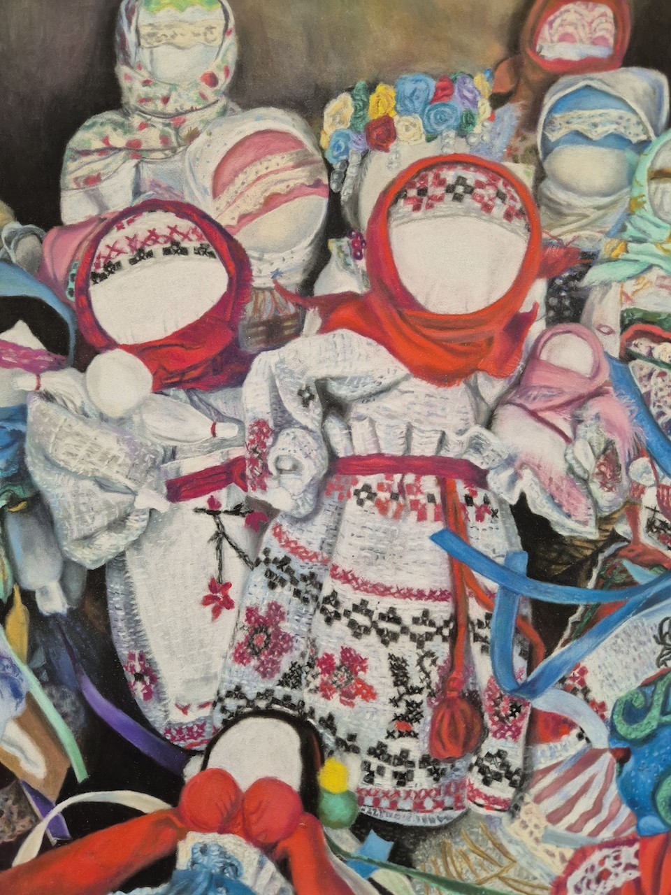 A painting of a group of dolls sitting on top of each other.