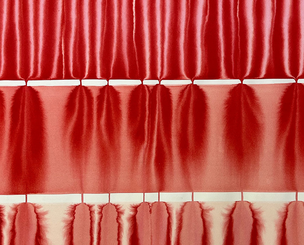 A red curtain with a white stripe on it.