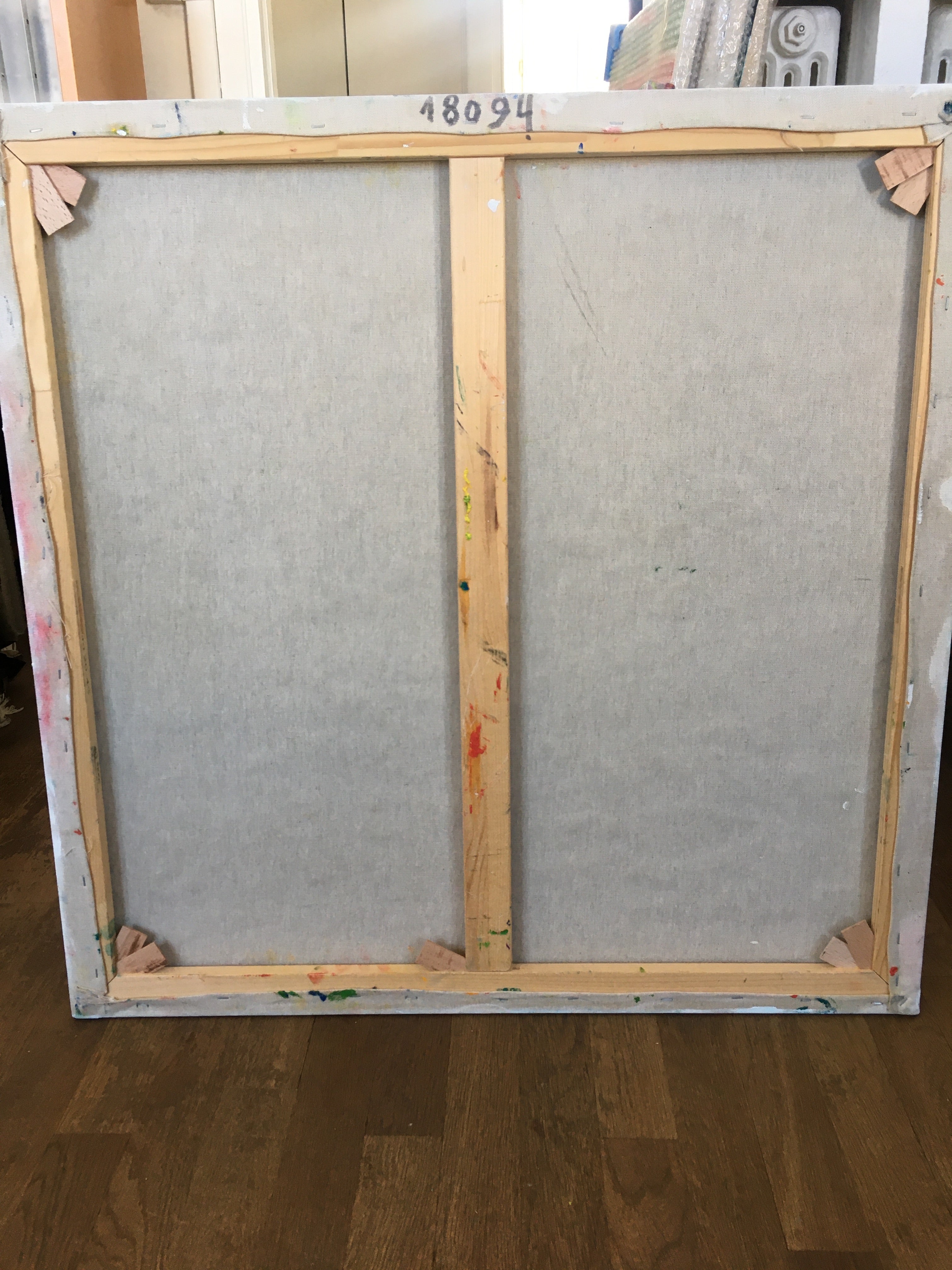 A large abstract painting on a white background. 