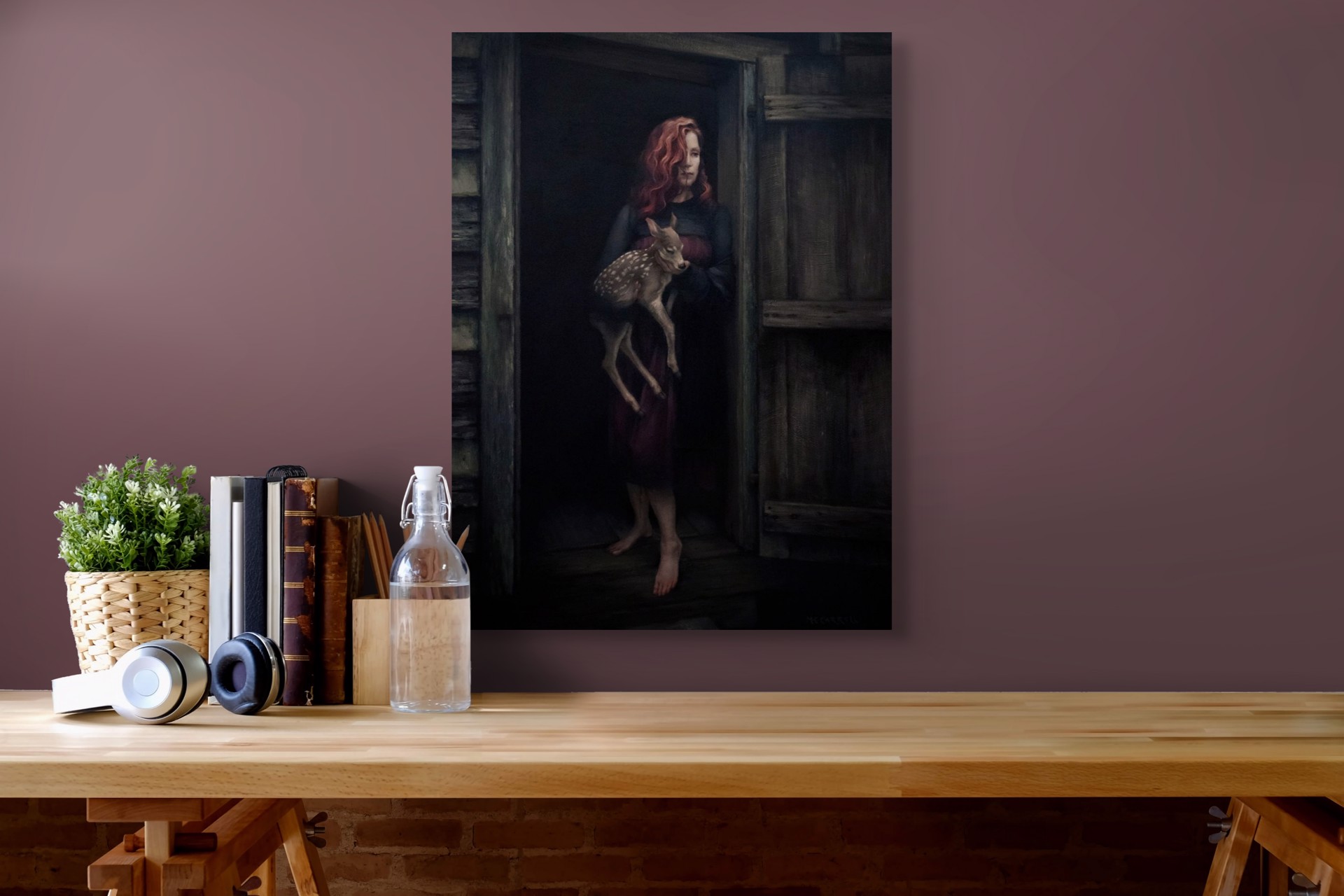 A woman holding a deer in a doorway.