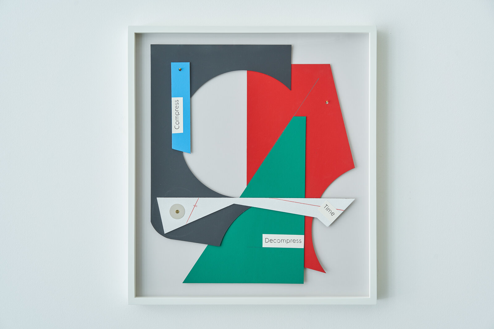 A set of four framed art pieces in a white frame.