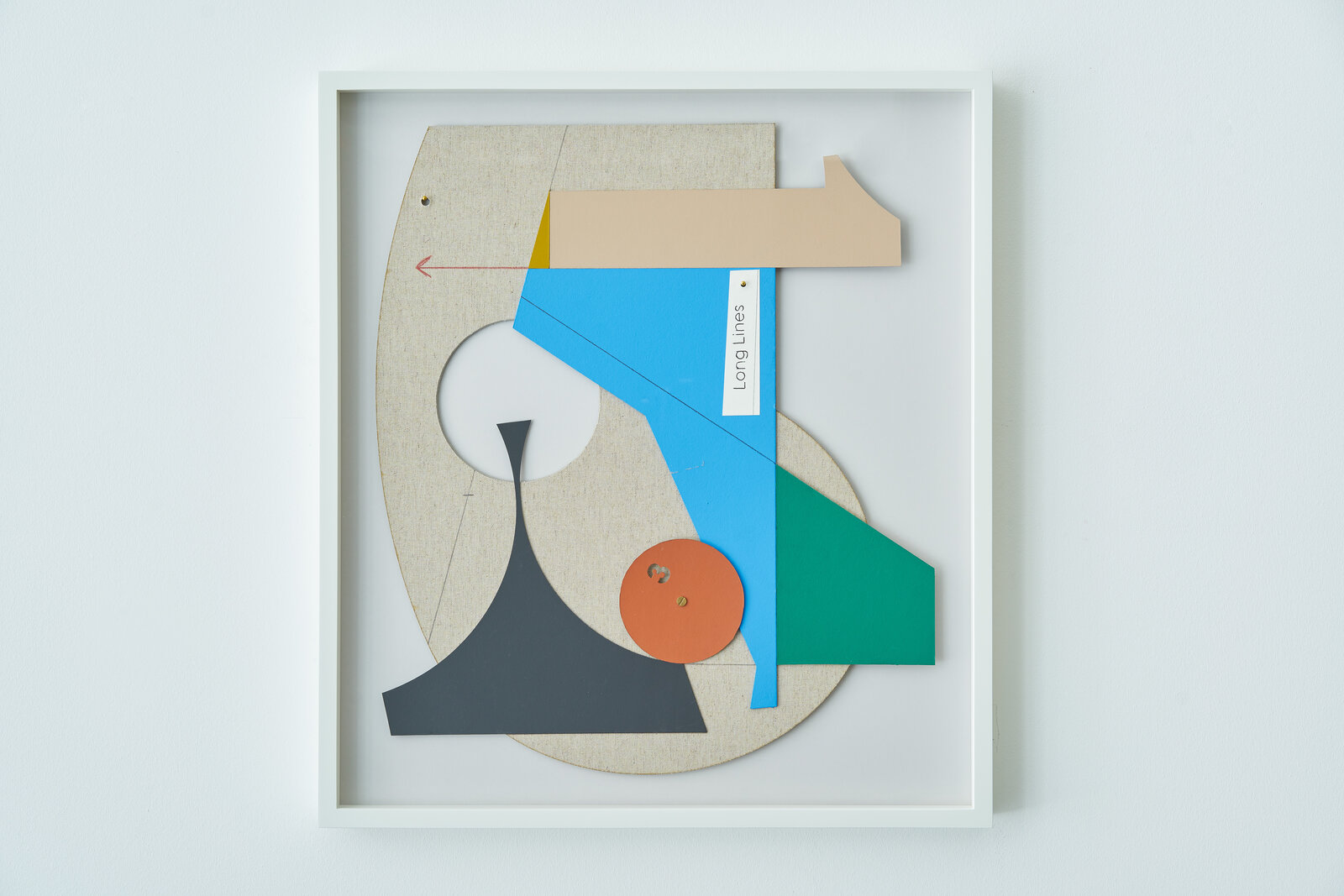 A set of four framed art pieces in a white frame.