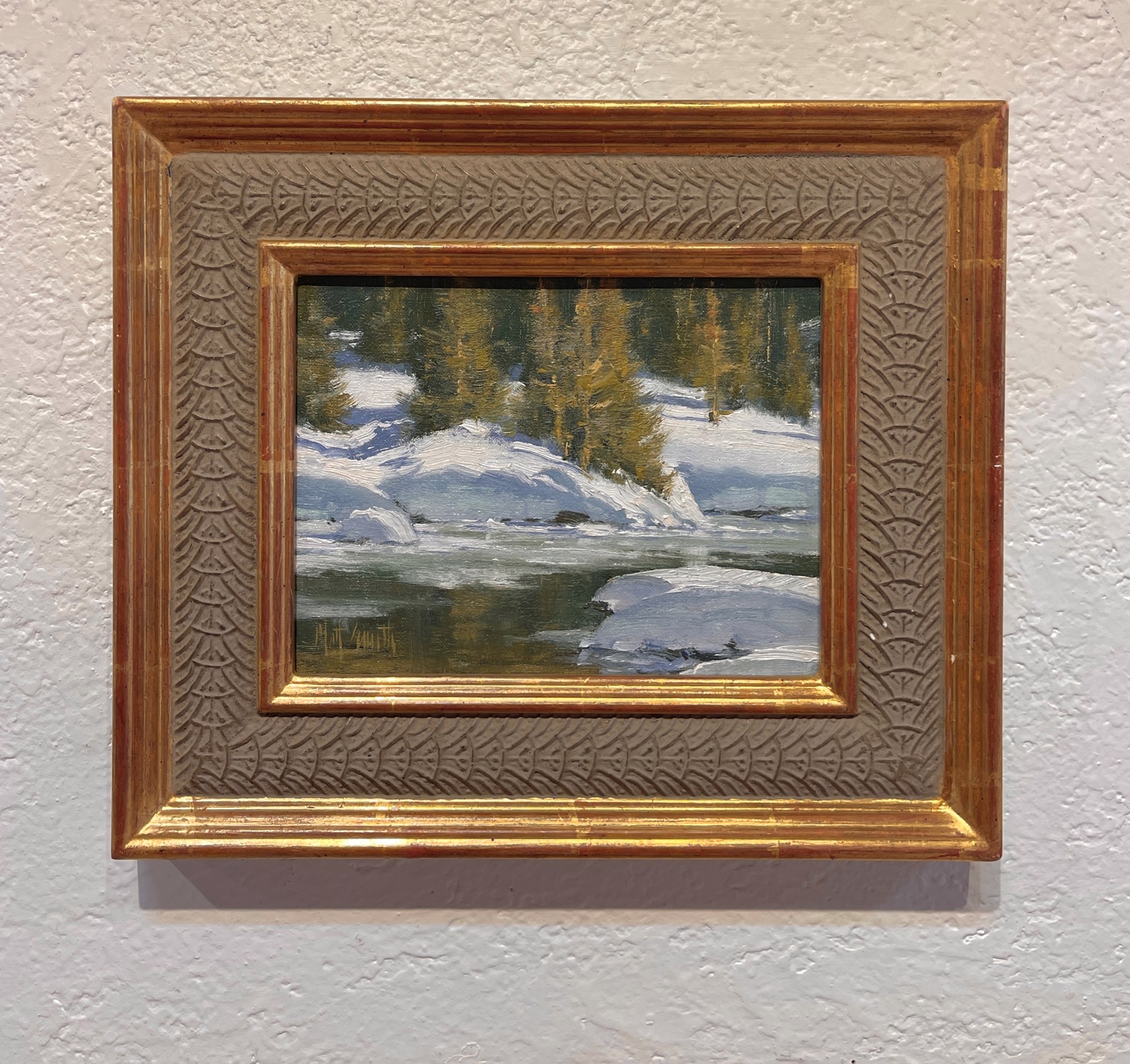 A painting of a snowy landscape with trees in the background.