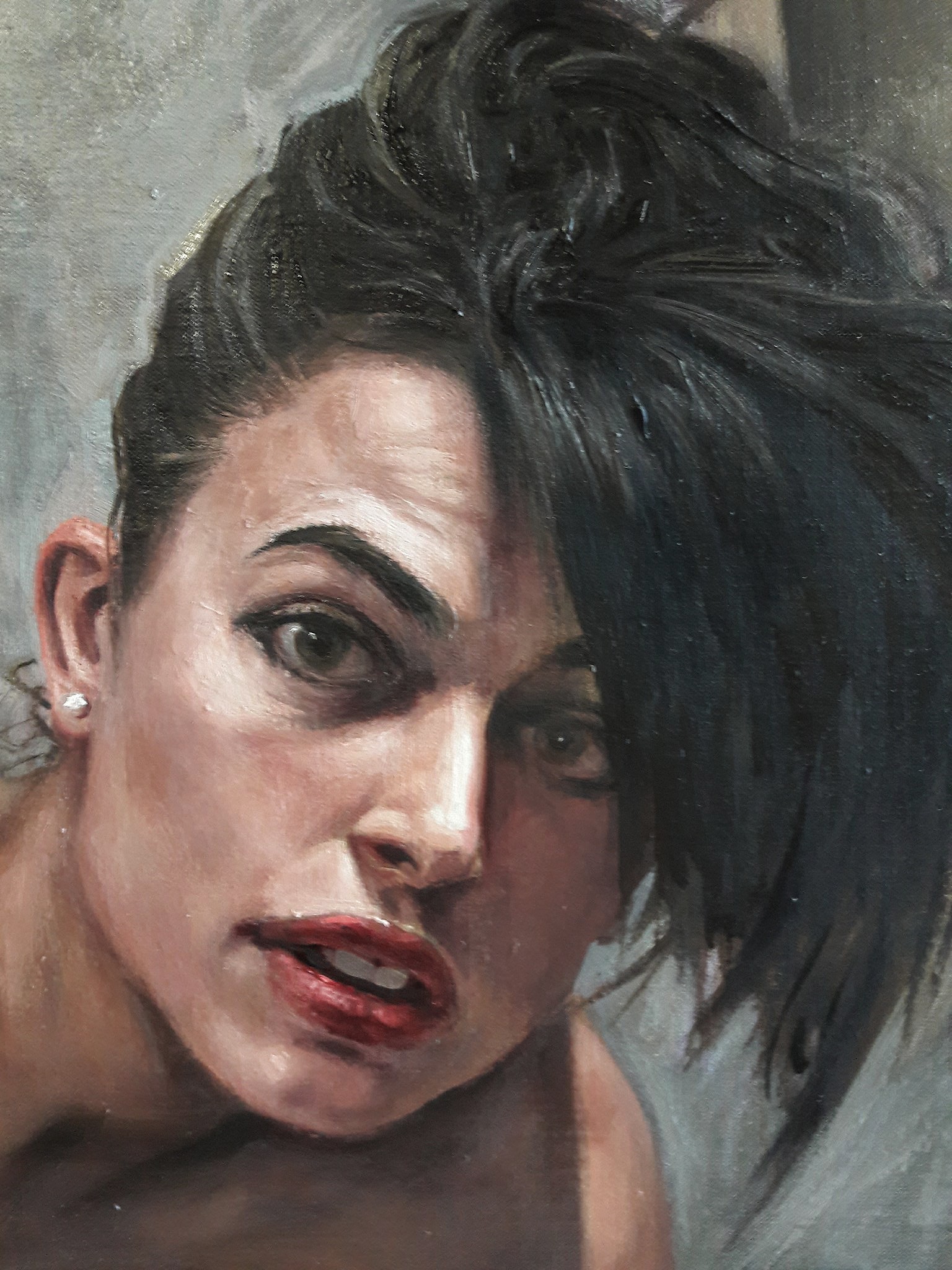 A painting of a woman with black hair and red lipstick.