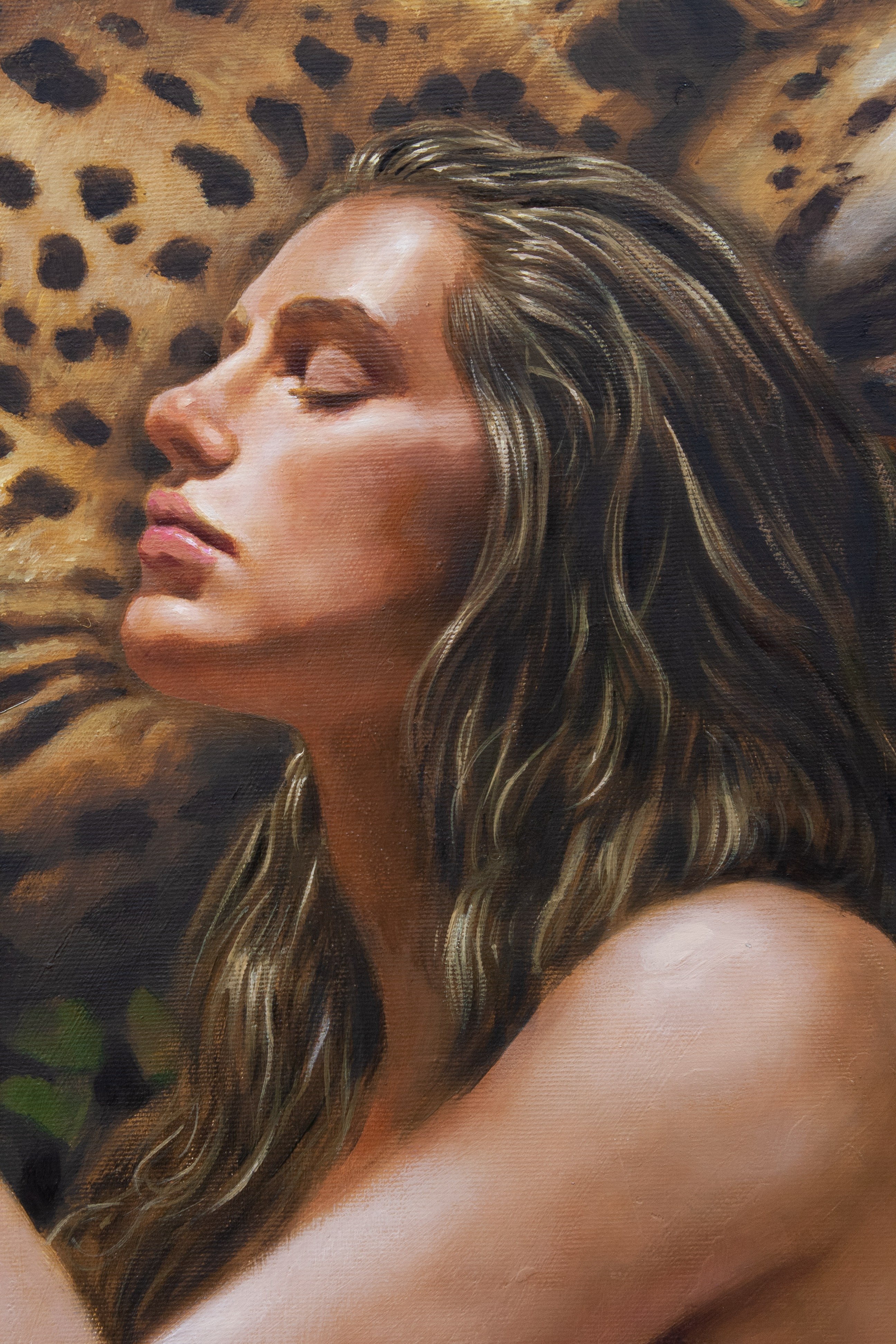 A serene portrait of a figure with closed eyes against a leopard-print background.