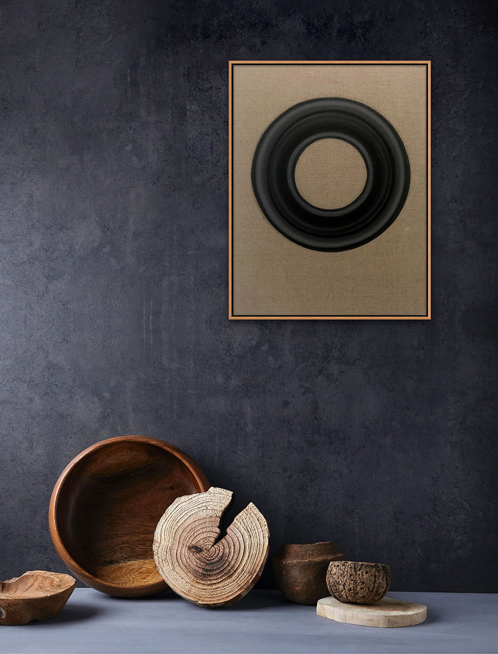 A black ring on a brown cardboard box. 