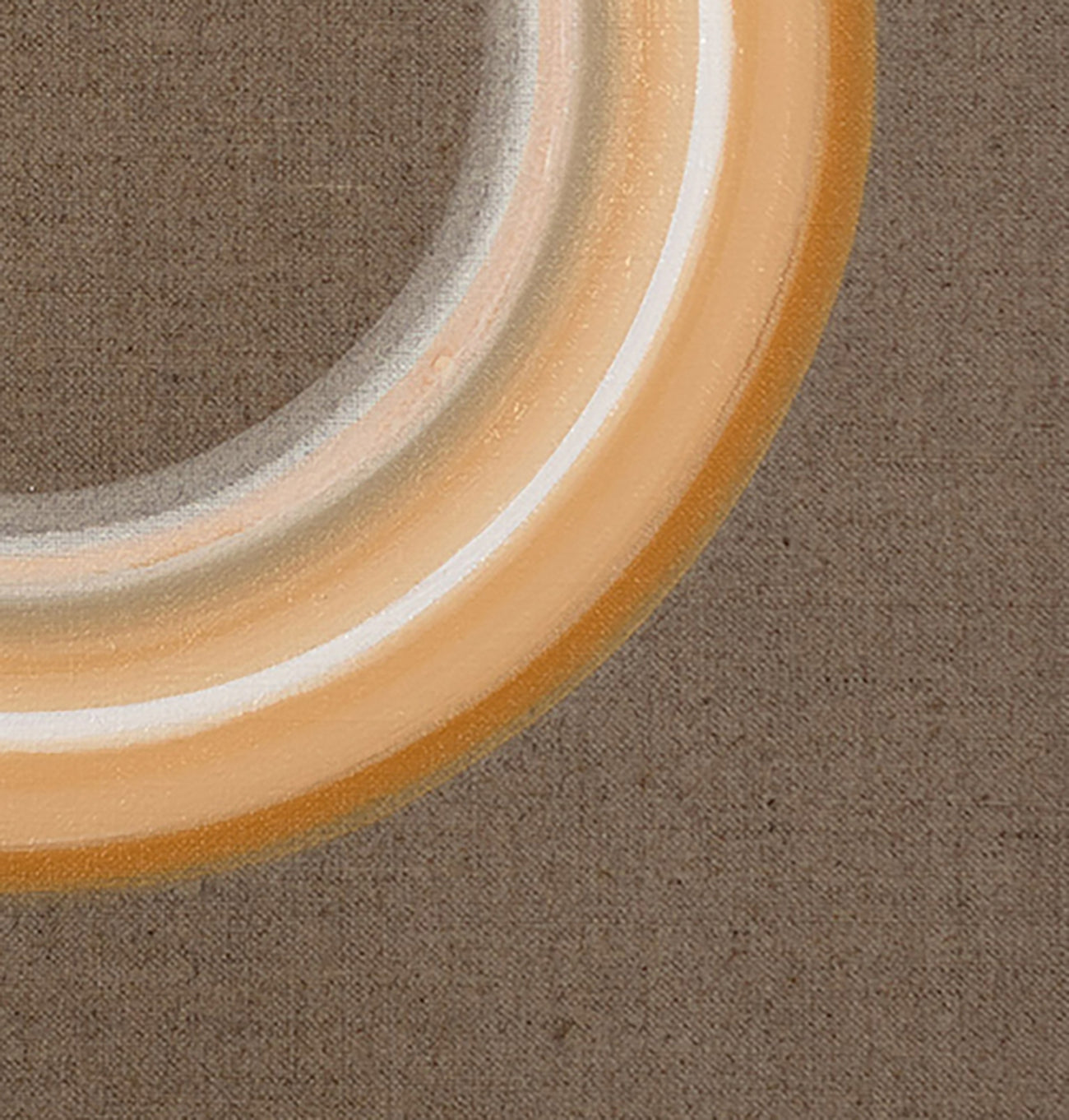 A picture of a circle on a brown background.