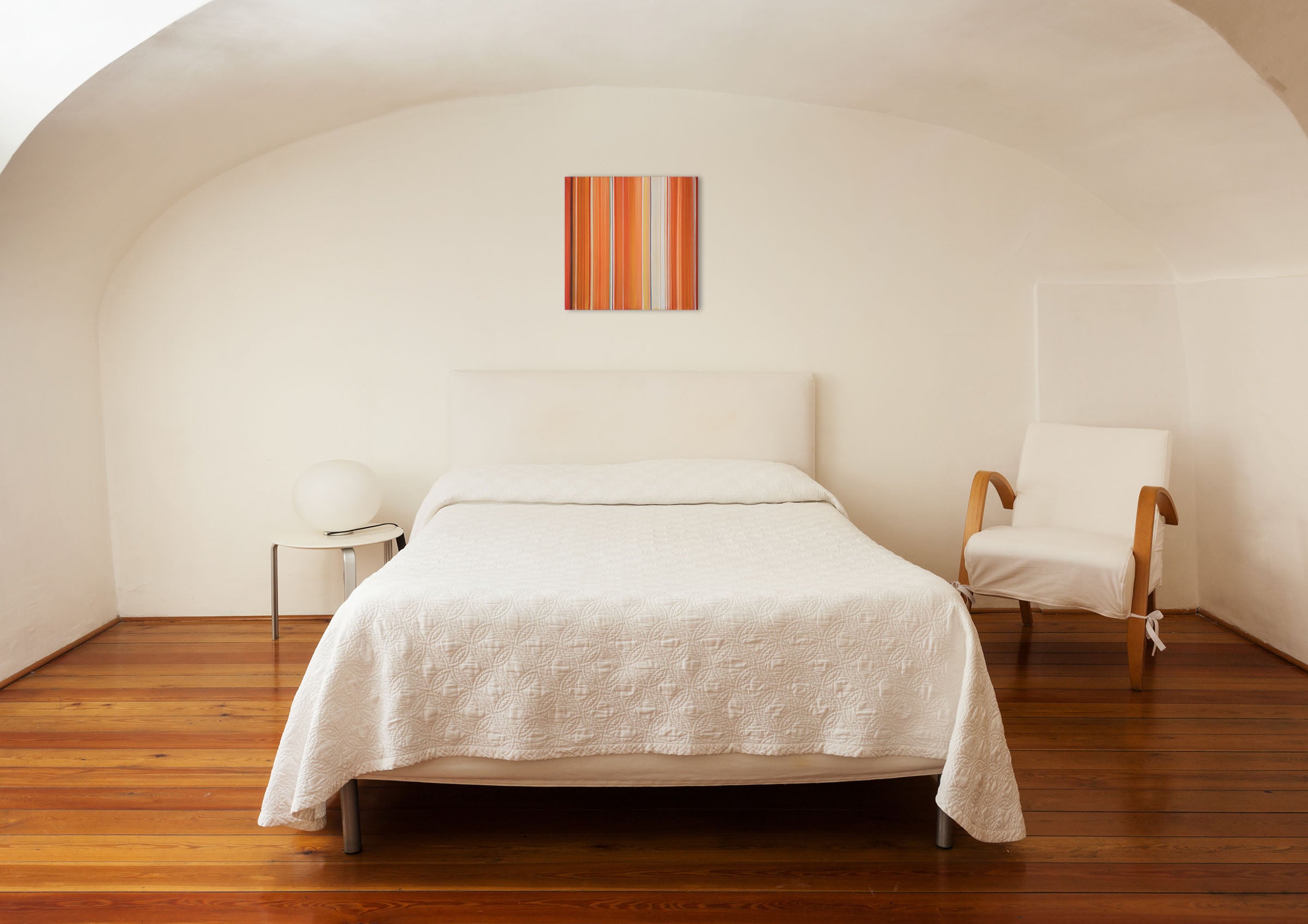 An orange and blue striped painting on a white background.