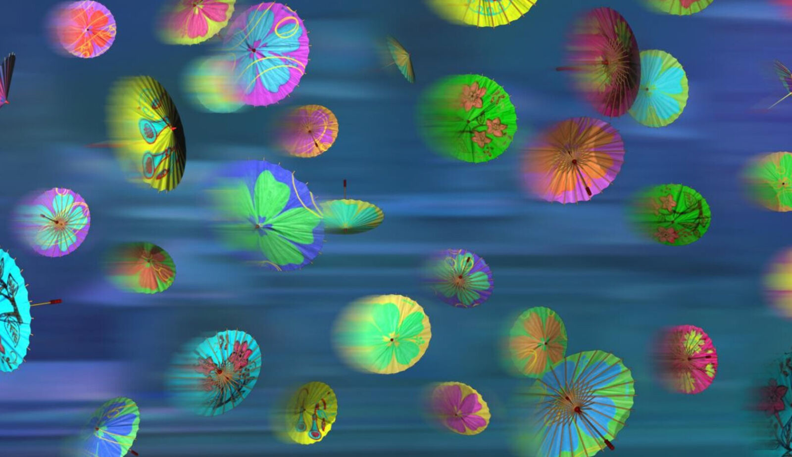 A bunch of colorful umbrellas floating in the air.
