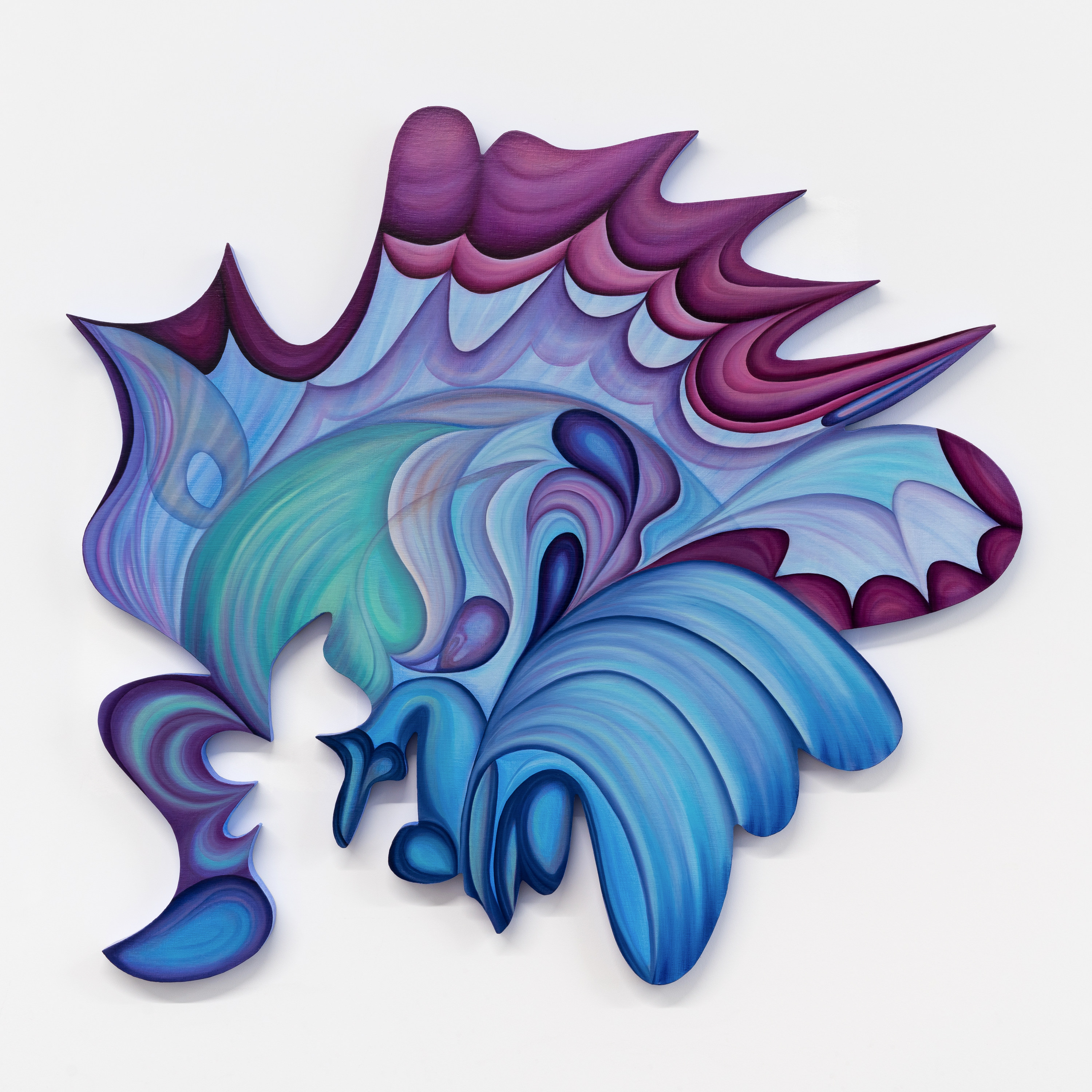 A blue and purple dragon made out of paper on a white background.