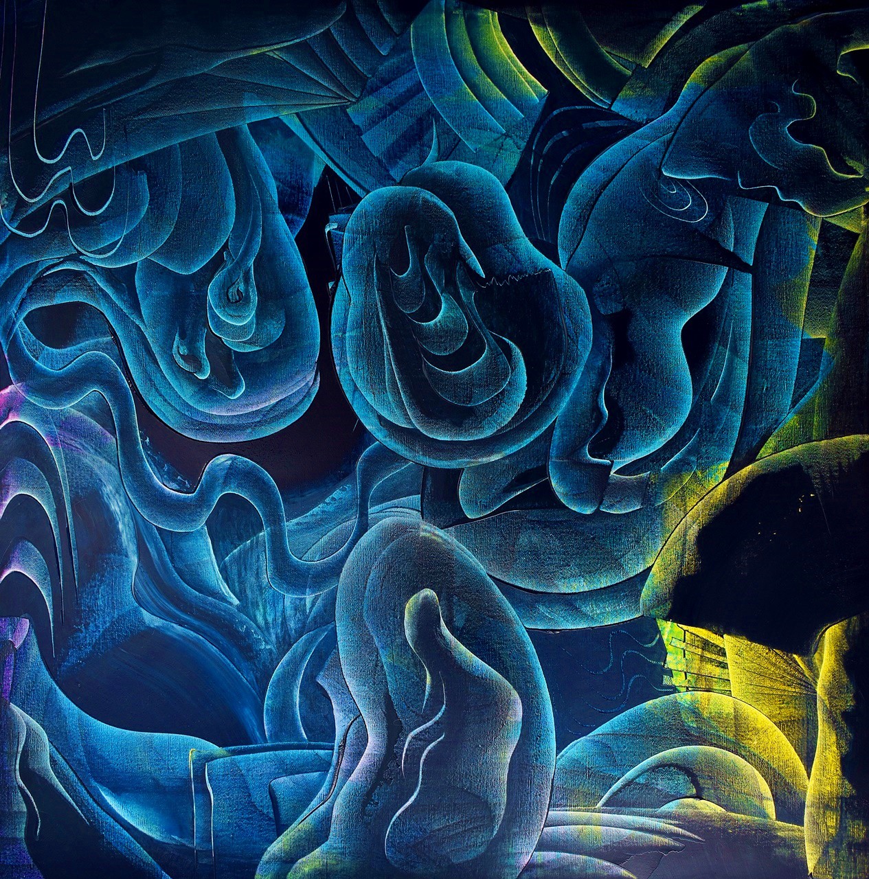 A swirling abstract composition of deep blue and green organic forms.