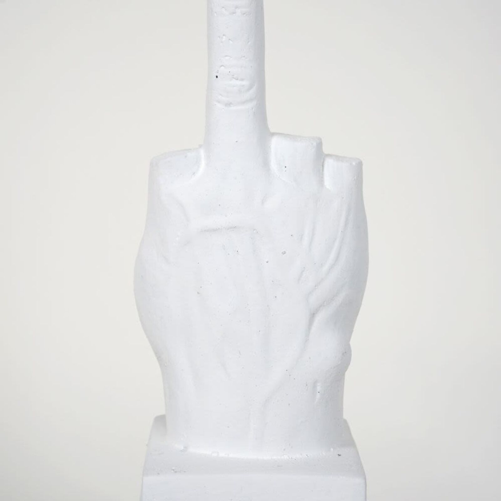 Artwork by Maurizio Cattelan, L.O.V. E. White, Made of Concrete 