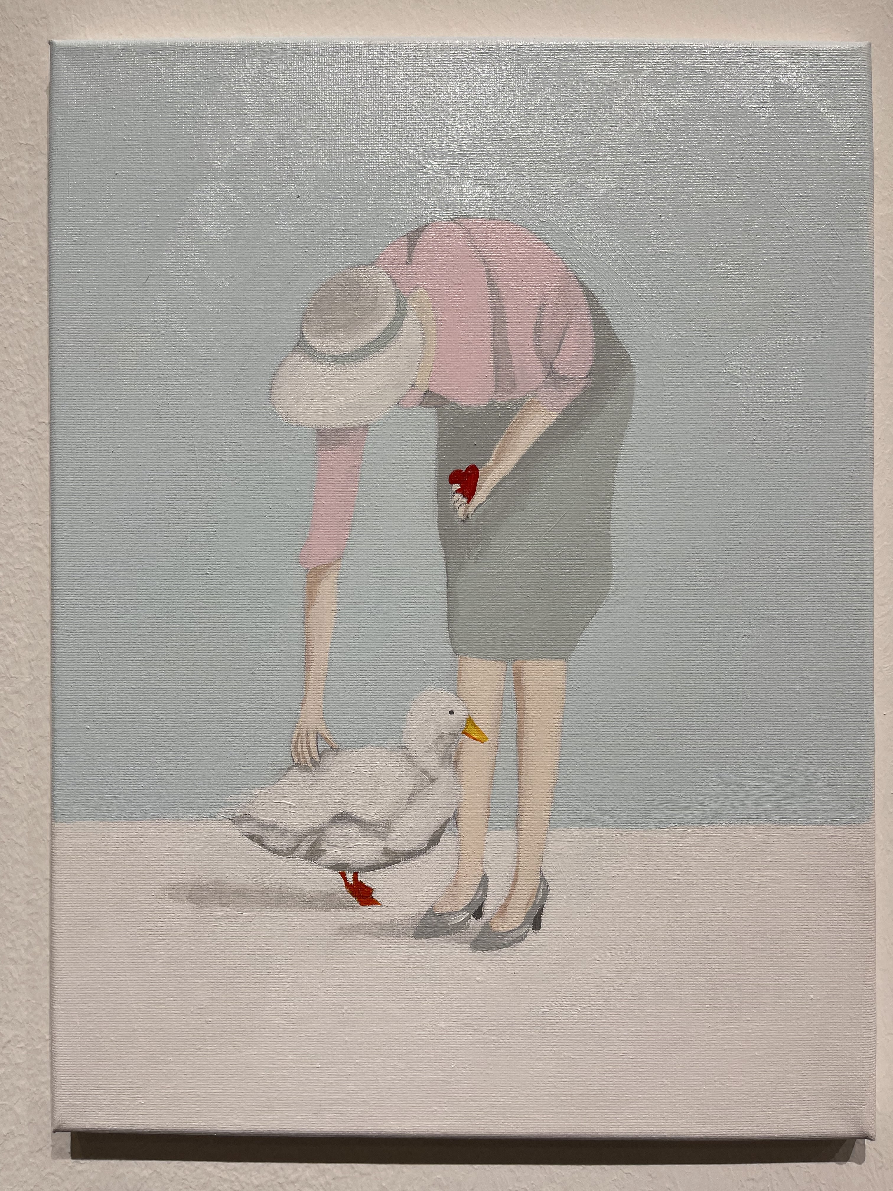 A painting of a woman feeding a duck with a heart.