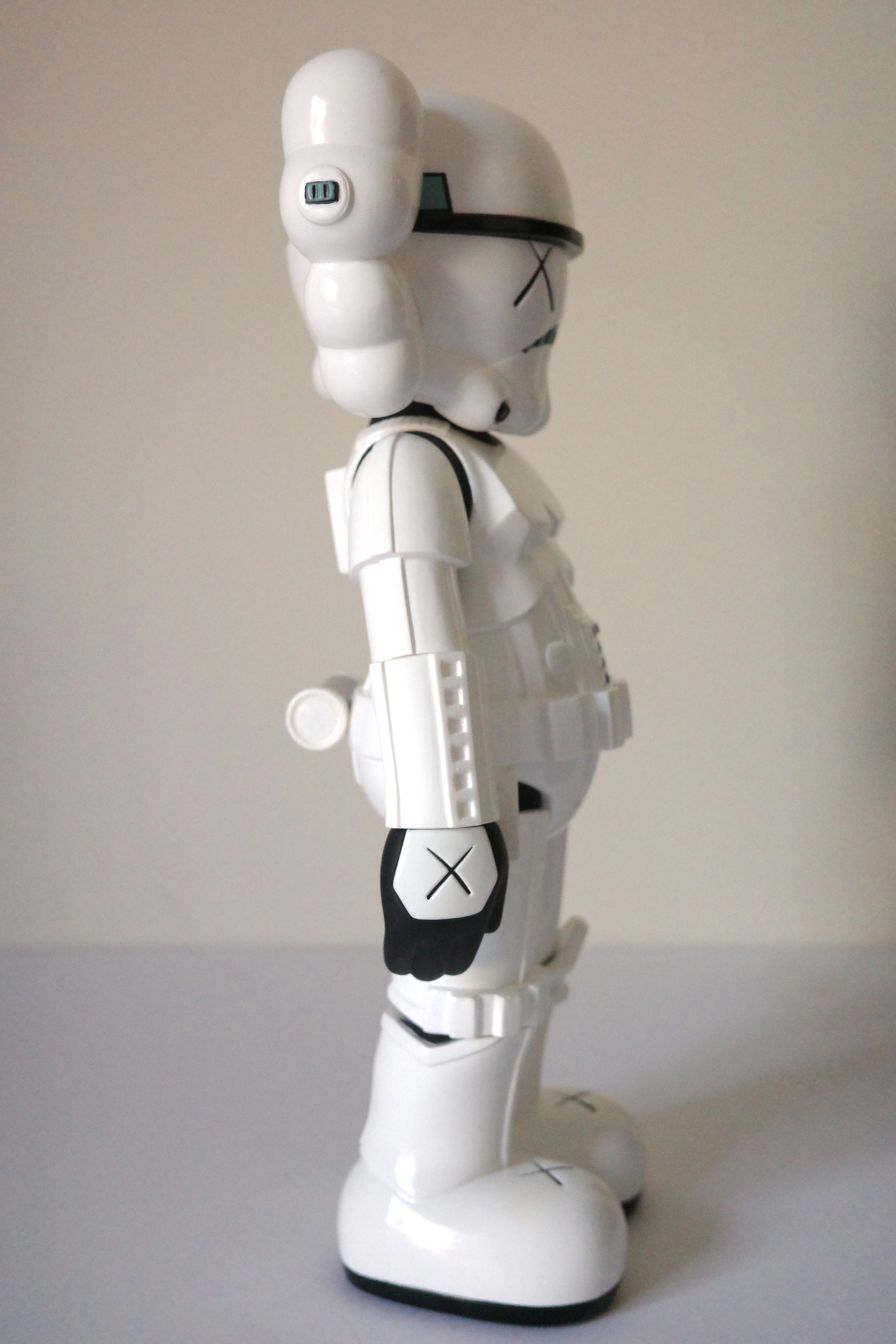 A white armored figure with cloud-like hair and X eyes stands against a plain background.