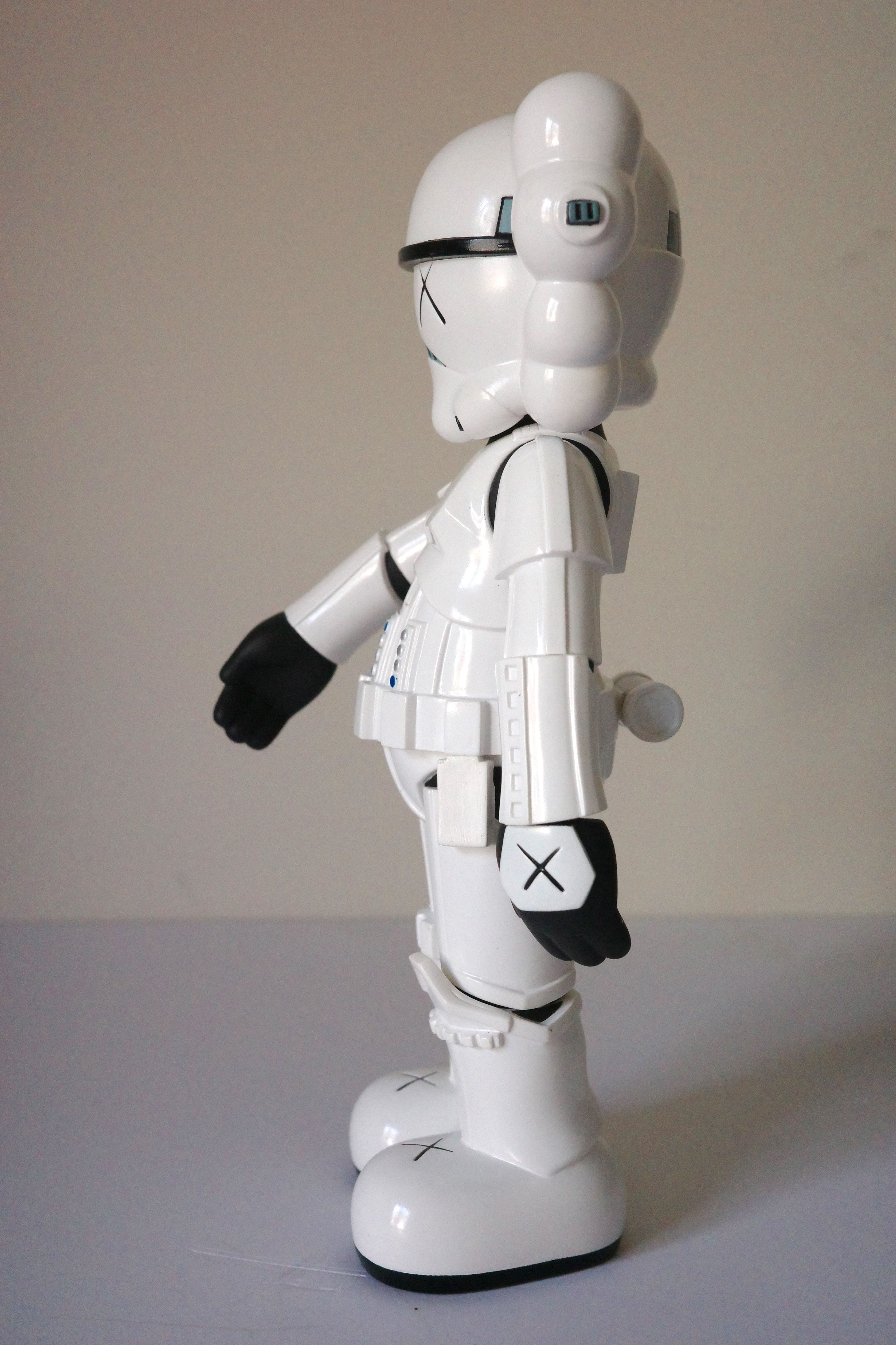 A white armored figure with cloud-like hair and X eyes stands against a plain background.