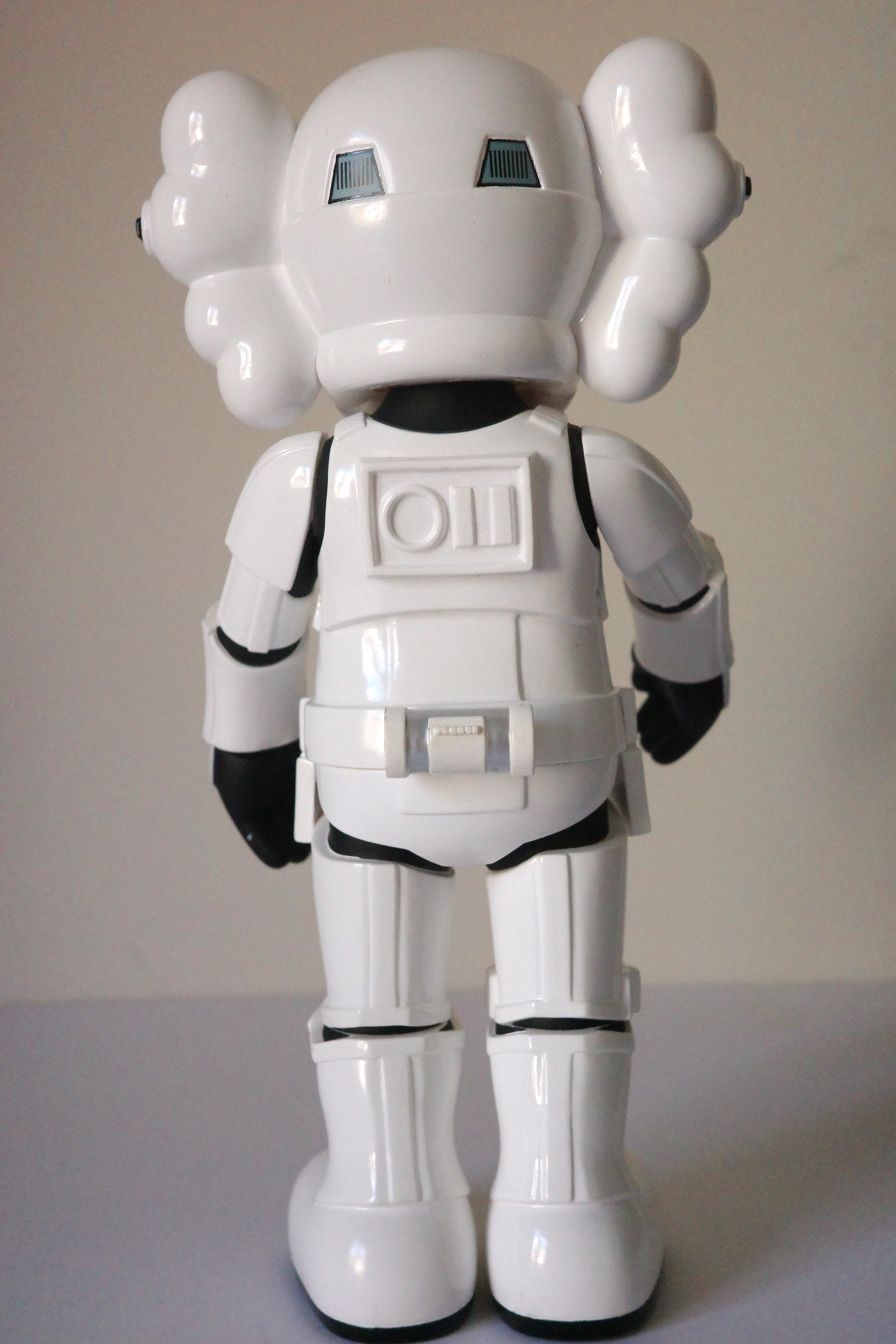 A white armored figure with cloud-like hair and X eyes stands against a plain background.