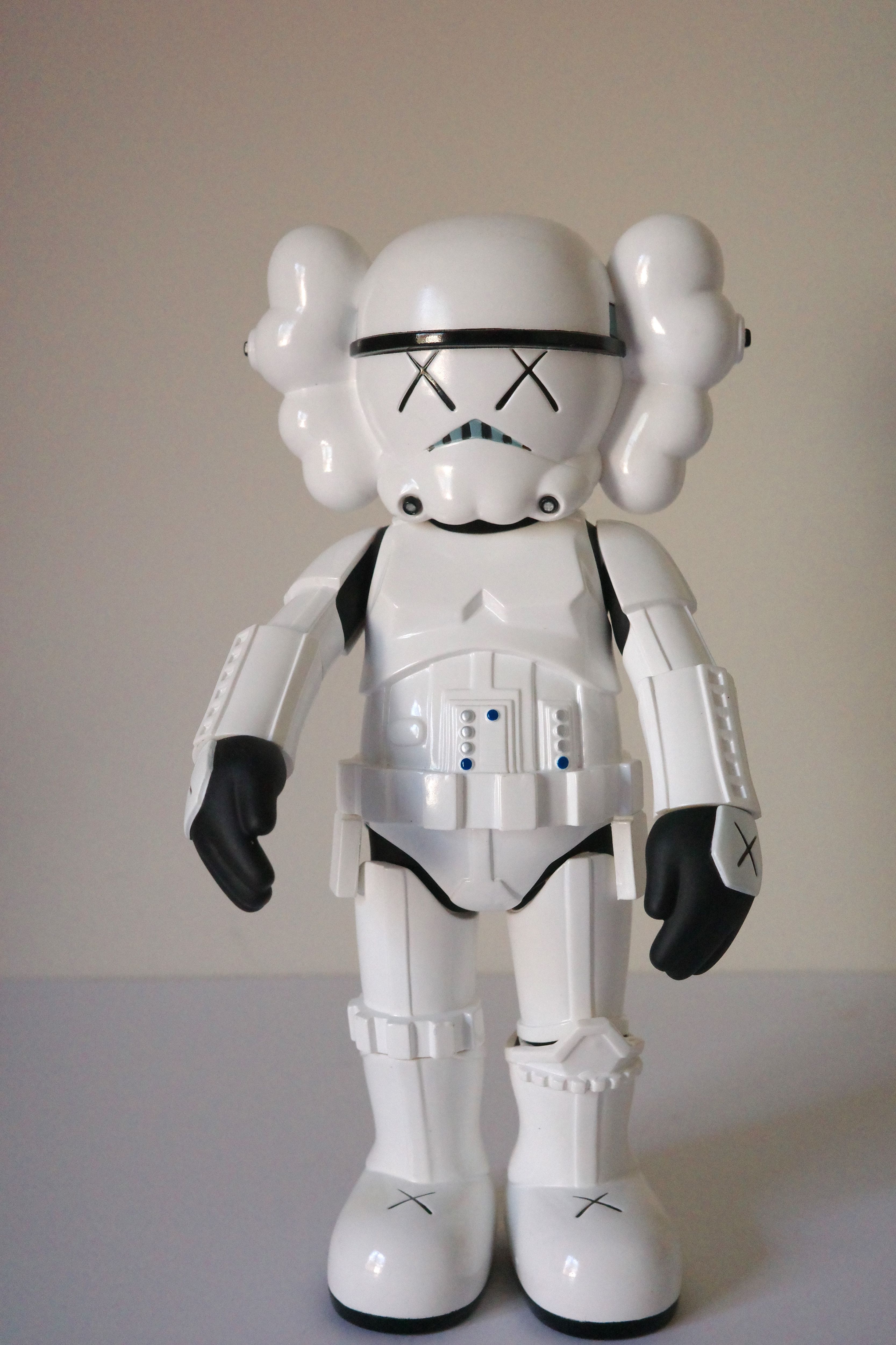 A white armored figure with cloud-like hair and X eyes stands against a plain background.