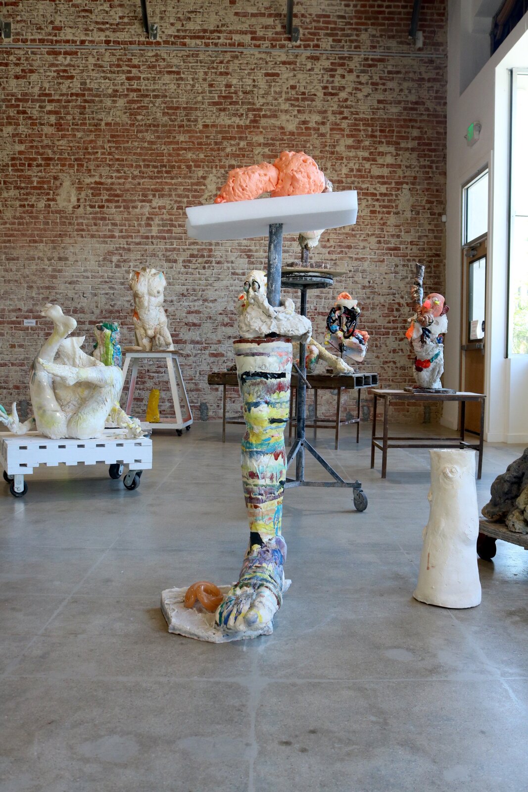 figures flanking a sacred tree by Meghan Smythe, 2018