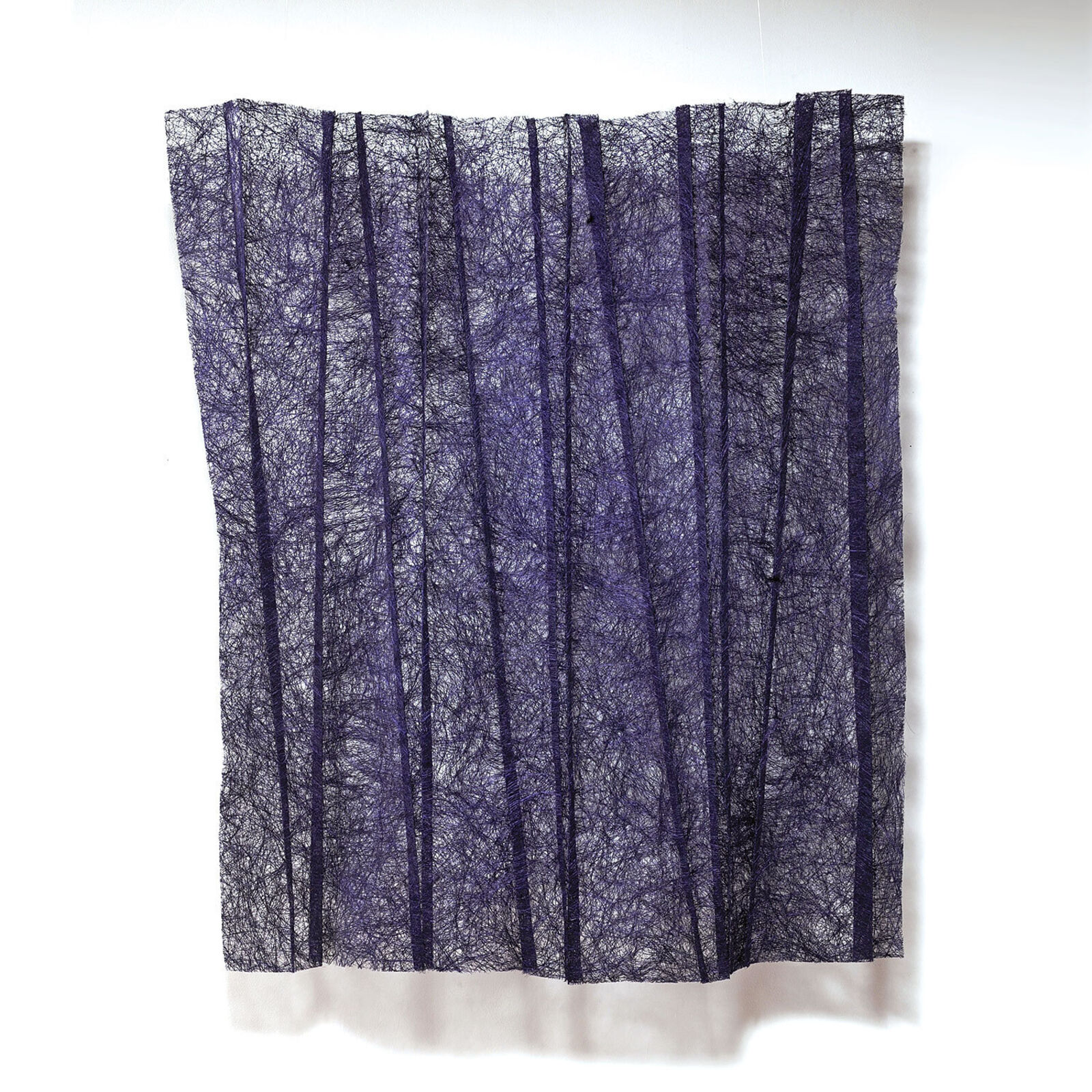 A textured textile artwork featuring vertical purple stripes on a white background.