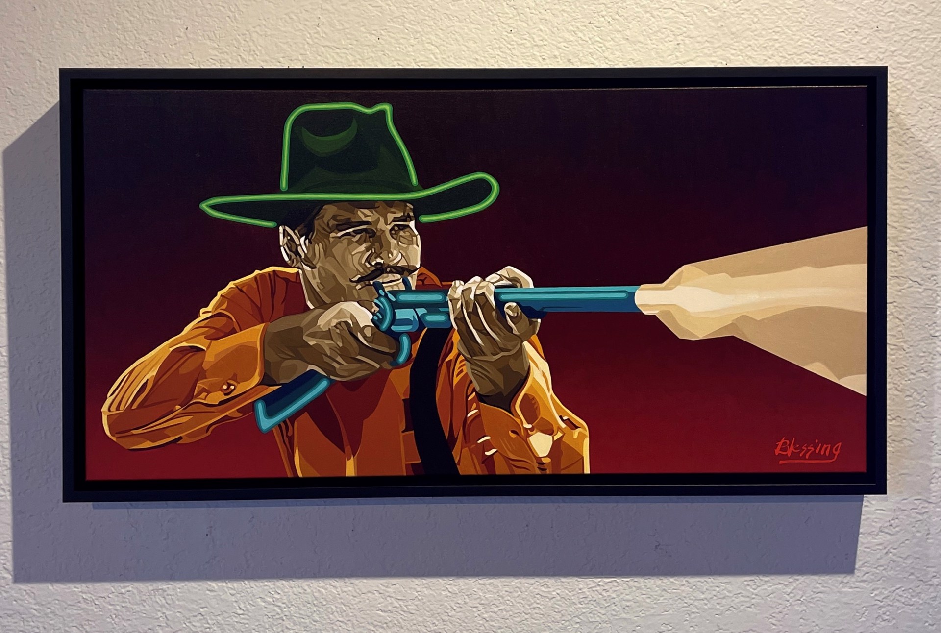 A stylized portrait of a figure in a cowboy hat aiming a blue revolver at an unseen target.