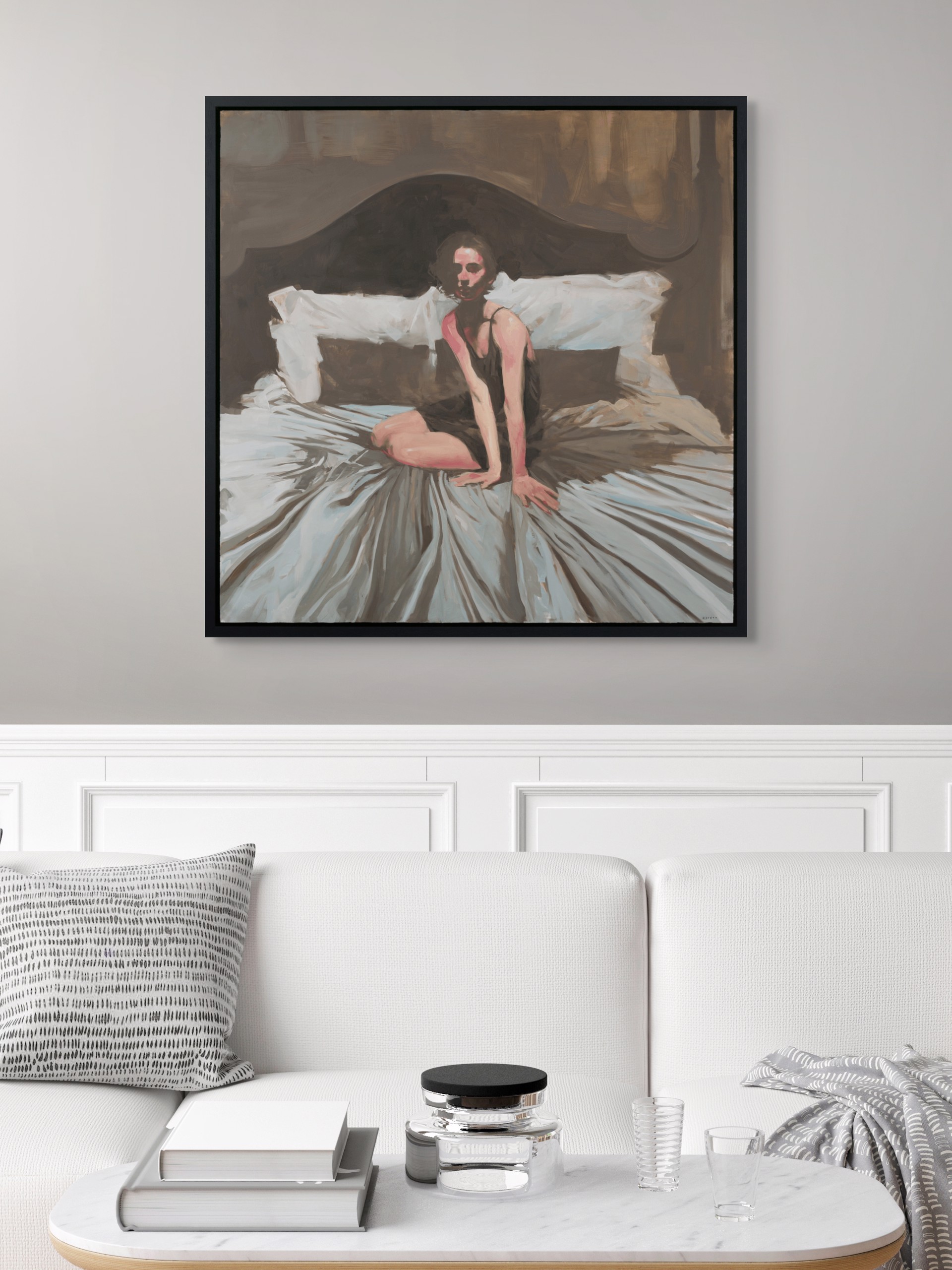 A figure sits on a bed in a dimly lit, intimate bedroom scene.