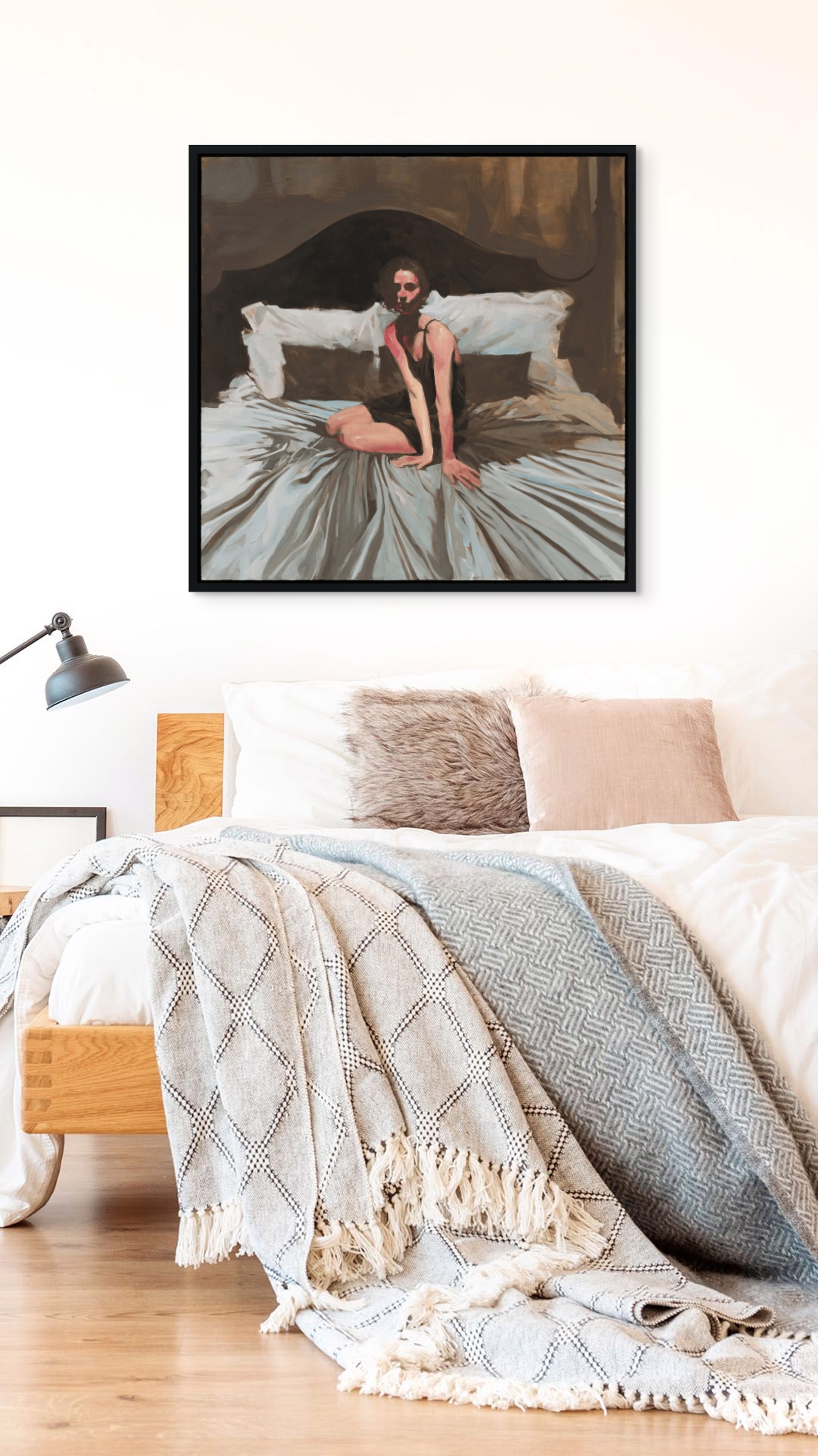 A figure sits on a bed in a dimly lit, intimate bedroom scene.
