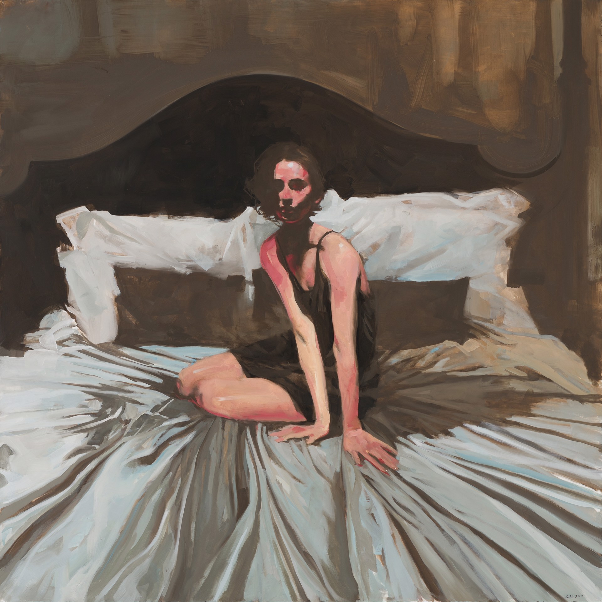 A figure sits on a bed in a dimly lit, intimate bedroom scene.