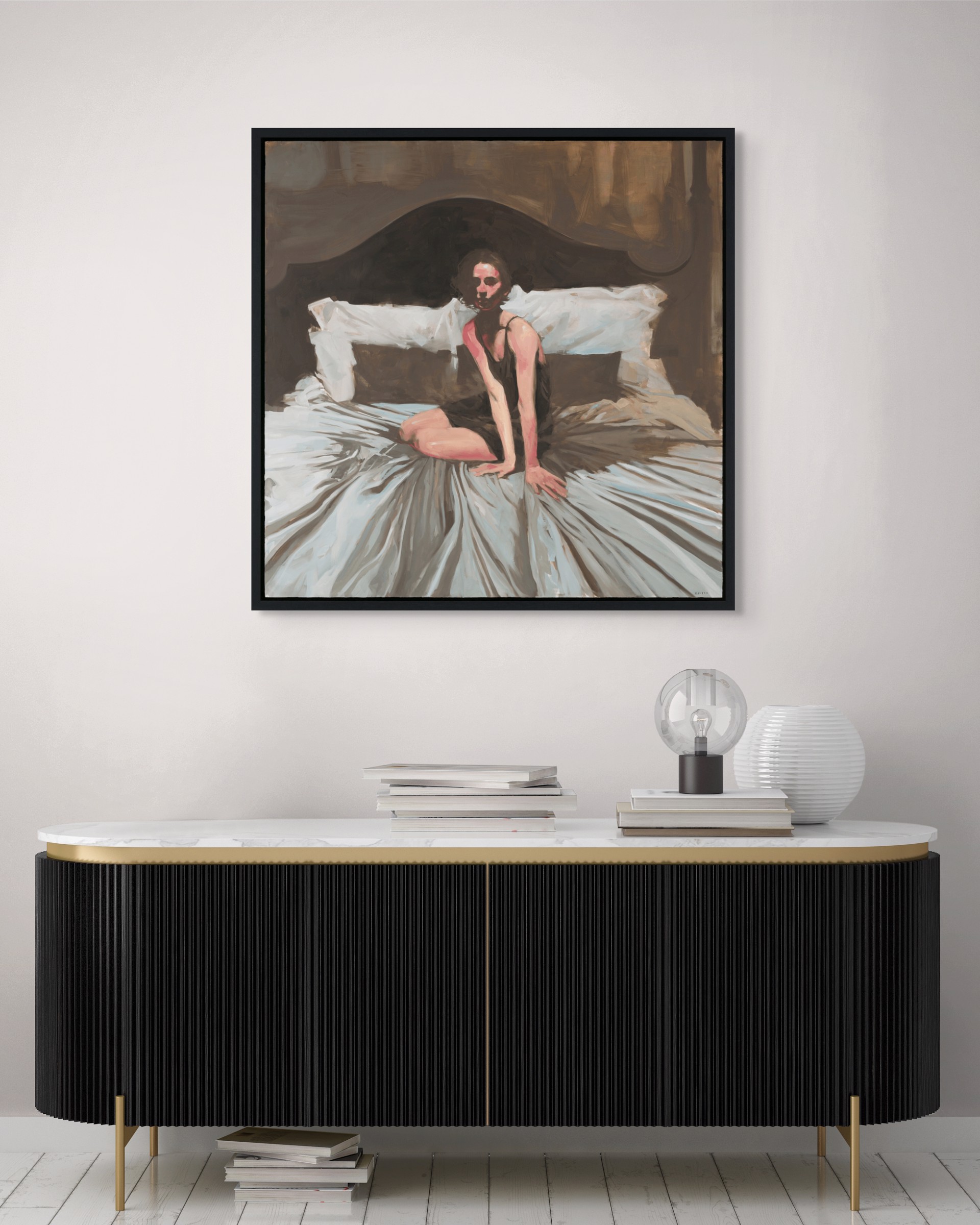 A figure sits on a bed in a dimly lit, intimate bedroom scene.